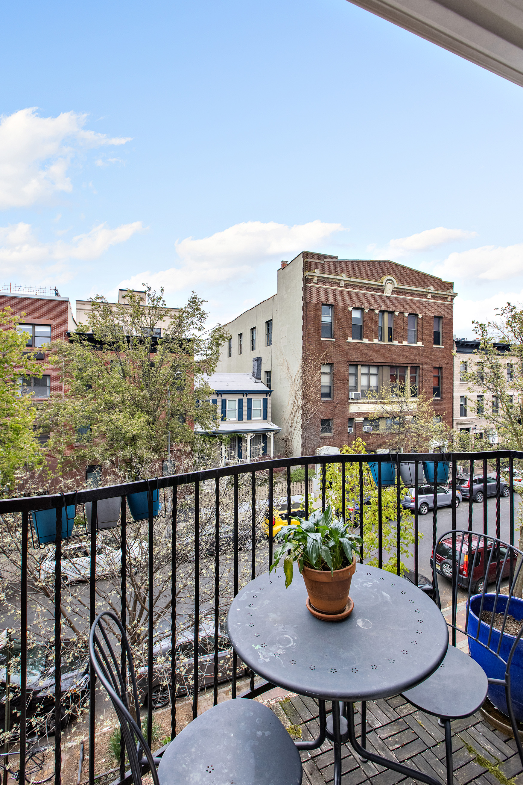 454 12th Street, Unit 3 Brooklyn, NY 11215 - Photo 11 of 18 a view of a balcony with table and chairs