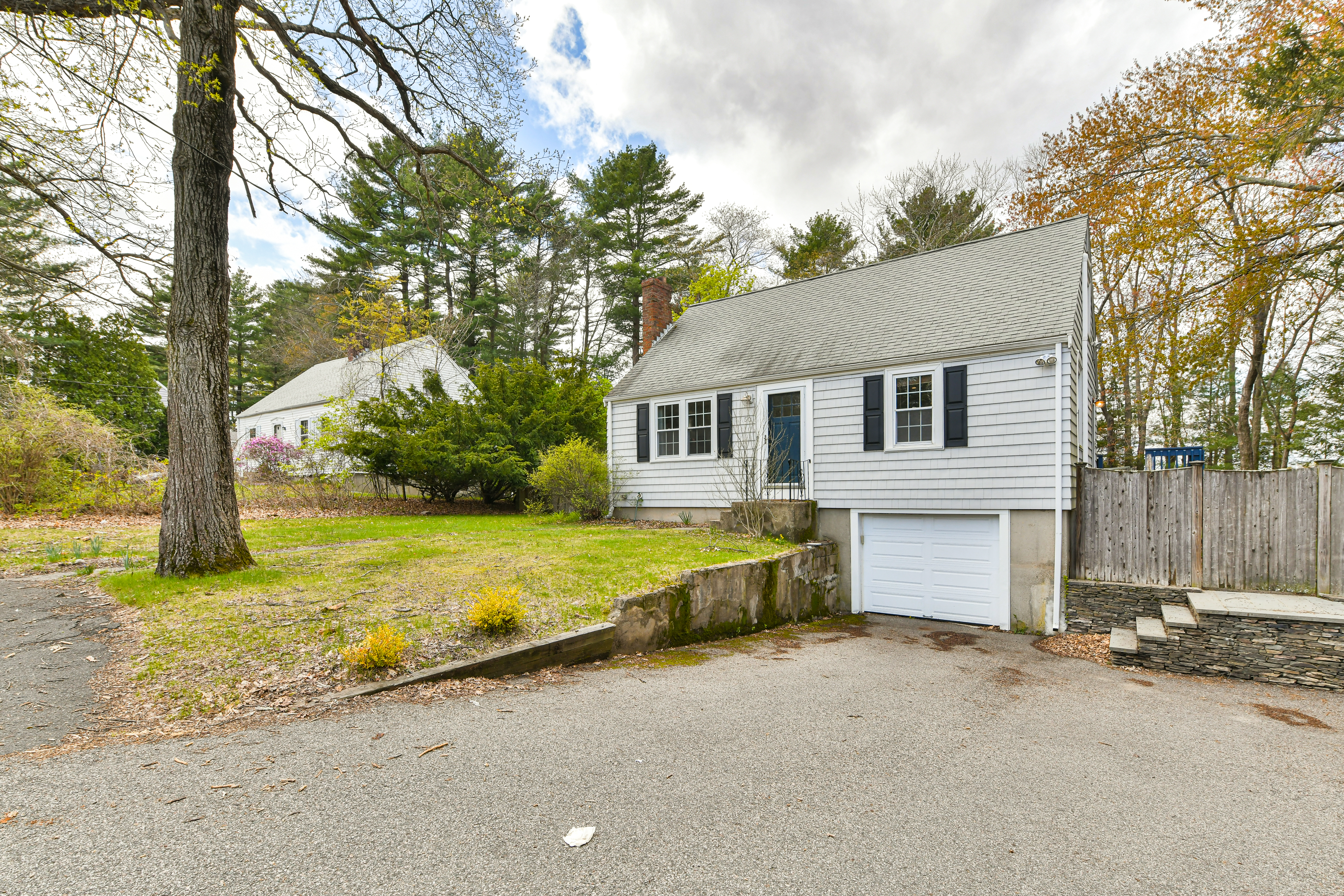 50 Rustic Road Walpole, MA 02032 - Photo 9 of 16 a view of a house with backyard and trees