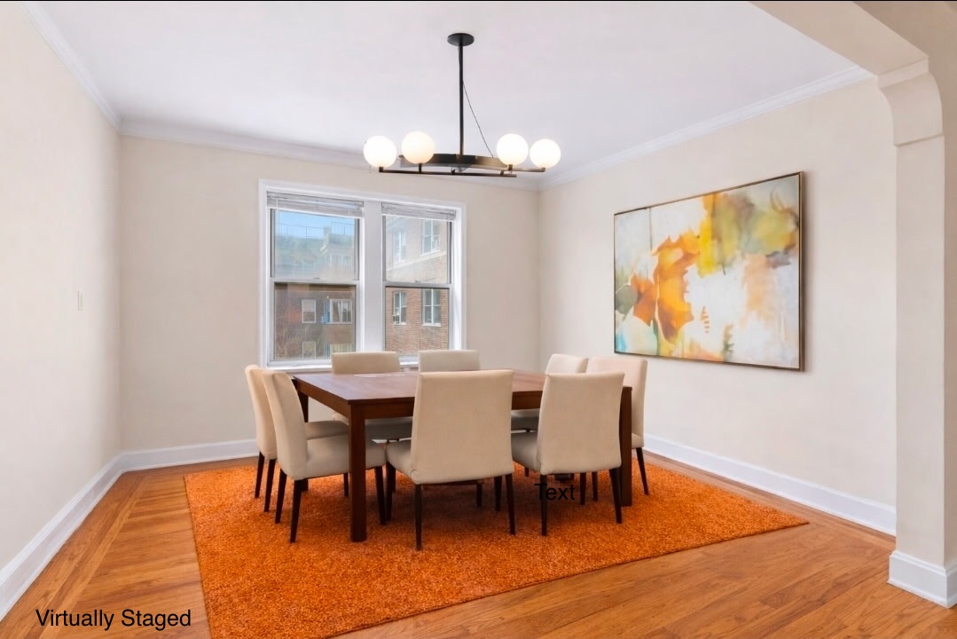 5444 Arlington Avenue, Unit G51 Bronx, NY 10471 - Photo 4 of 16 a view of a dining room with furniture wooden floor and chandelier