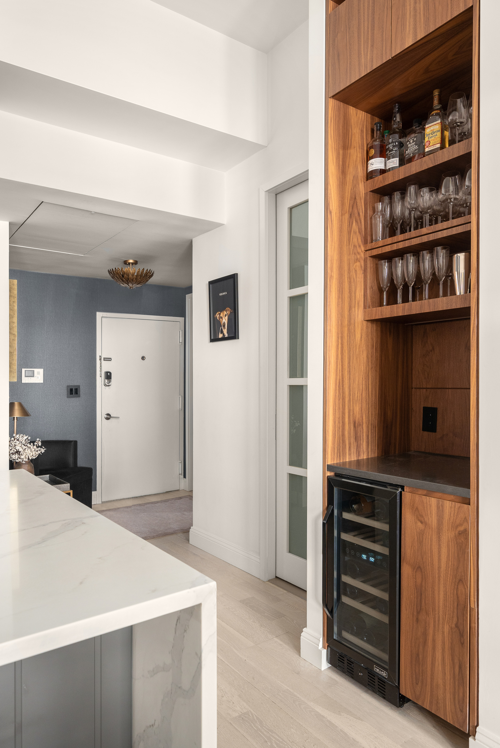 521 West 47th Street, Unit 3B Manhattan, NY 10036 - Photo 8 of 15 a view of walk in closet with clothes and shoes