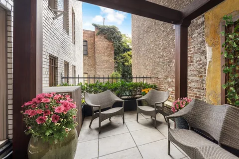 a garden view with a seating space