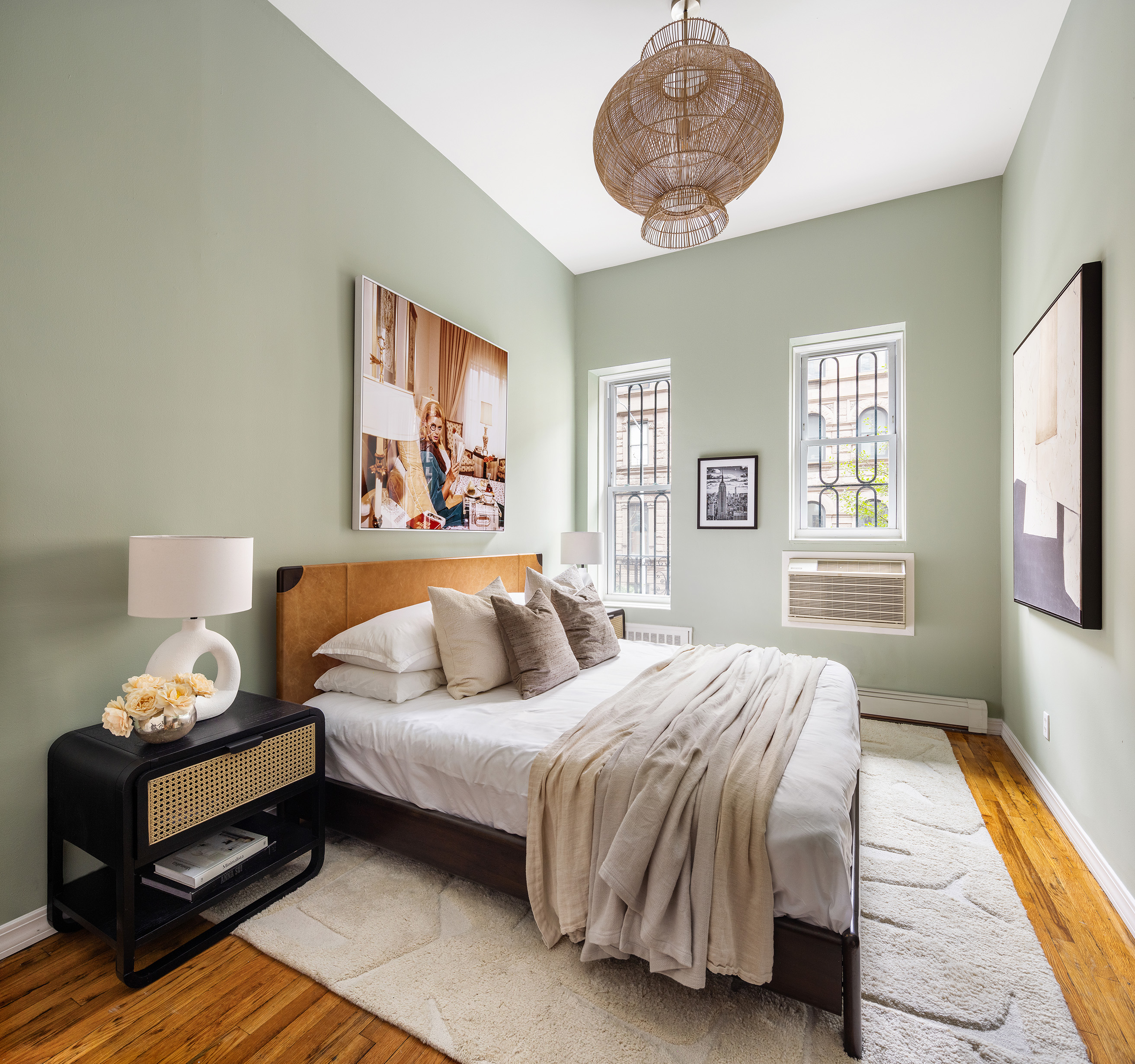 107 West 78th Street, Unit B Manhattan, NY 10024 - Photo 7 of 15 a bedroom with a bed and wooden floor