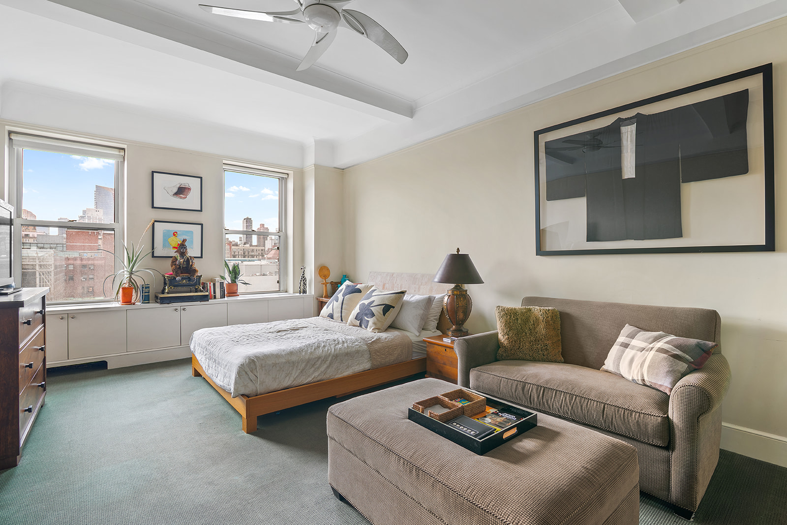 15 West 81st Street, Unit 10B Manhattan, NY 10024 - Photo 7 of 19 a living room with couches and painting on the wall