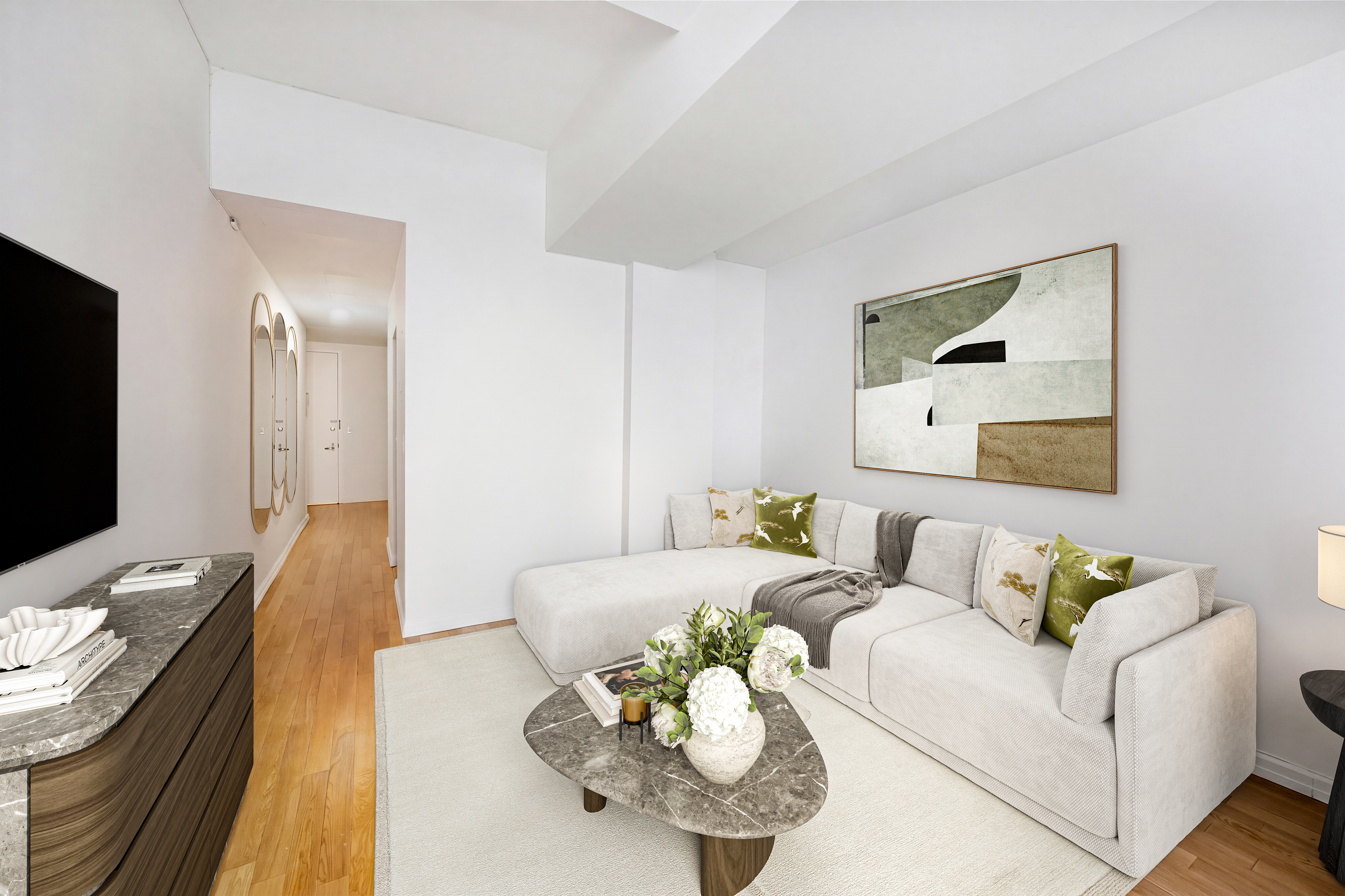 99 John Street, Unit 208 Manhattan, NY 10038 - Photo 2 of 18 a living room with furniture and a flat screen tv