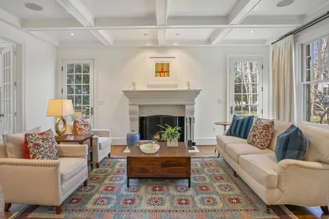 a view of an outdoor sitting area with furniture and backyard