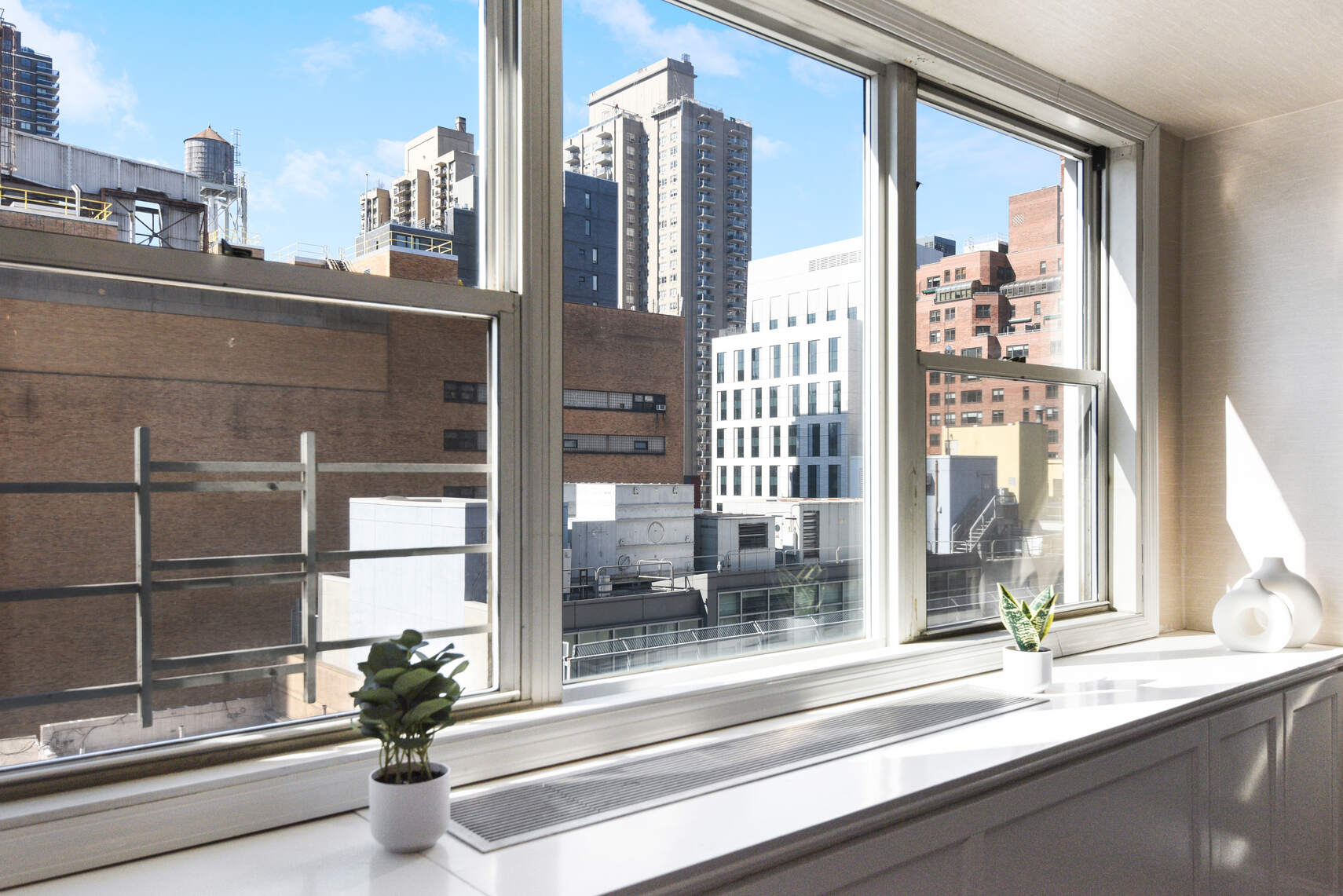 520 East 76th Street, Unit 11C Manhattan, NY 10021 - Photo 5 of 15 a view of a glass door with a glass door