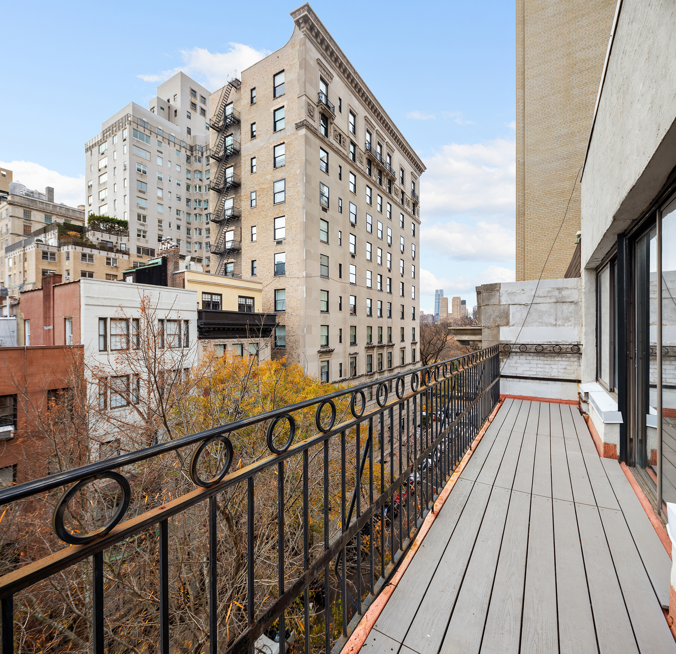 7 East 74th Street, Unit PH Manhattan, NY 10021 - Photo 3 of 10 a view of balcony with wooden floor and staircase