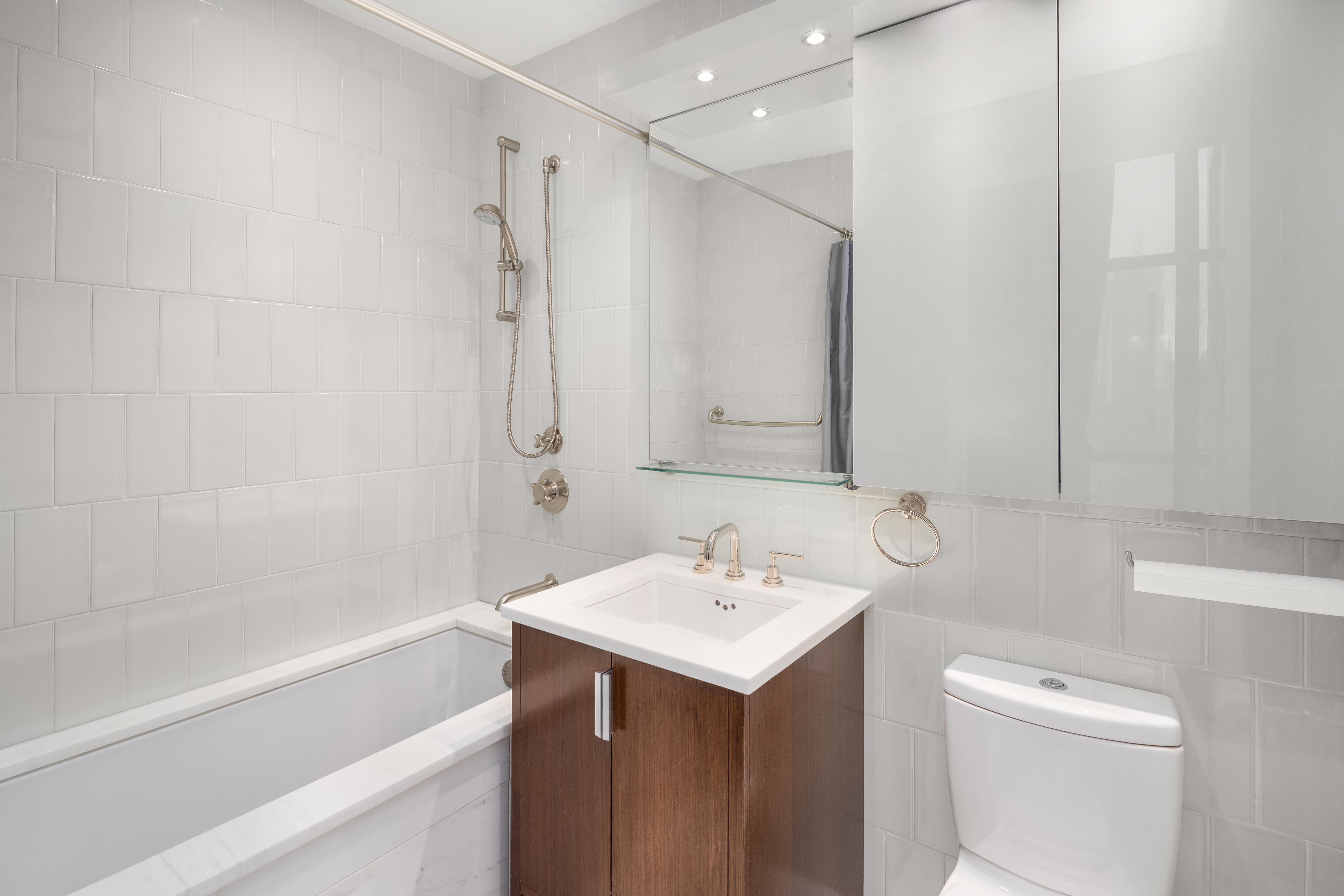 60 Riverside Boulevard, Unit PH4001 Manhattan, NY 10069 - Photo 10 of 33 a bathroom with a sink a toilet and shower