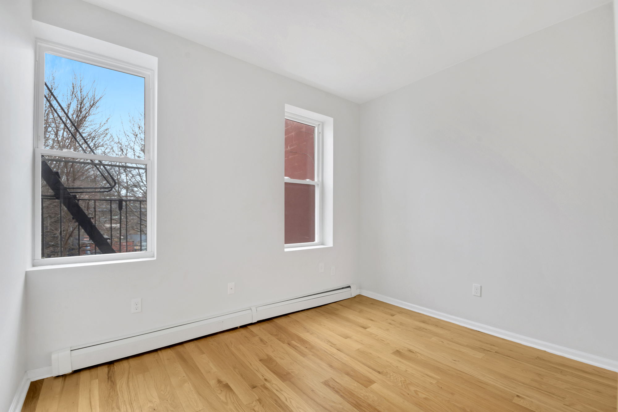 184 Herkimer Street, Unit 2 Brooklyn, NY 11216 - Photo 5 of 9 an empty room with a window