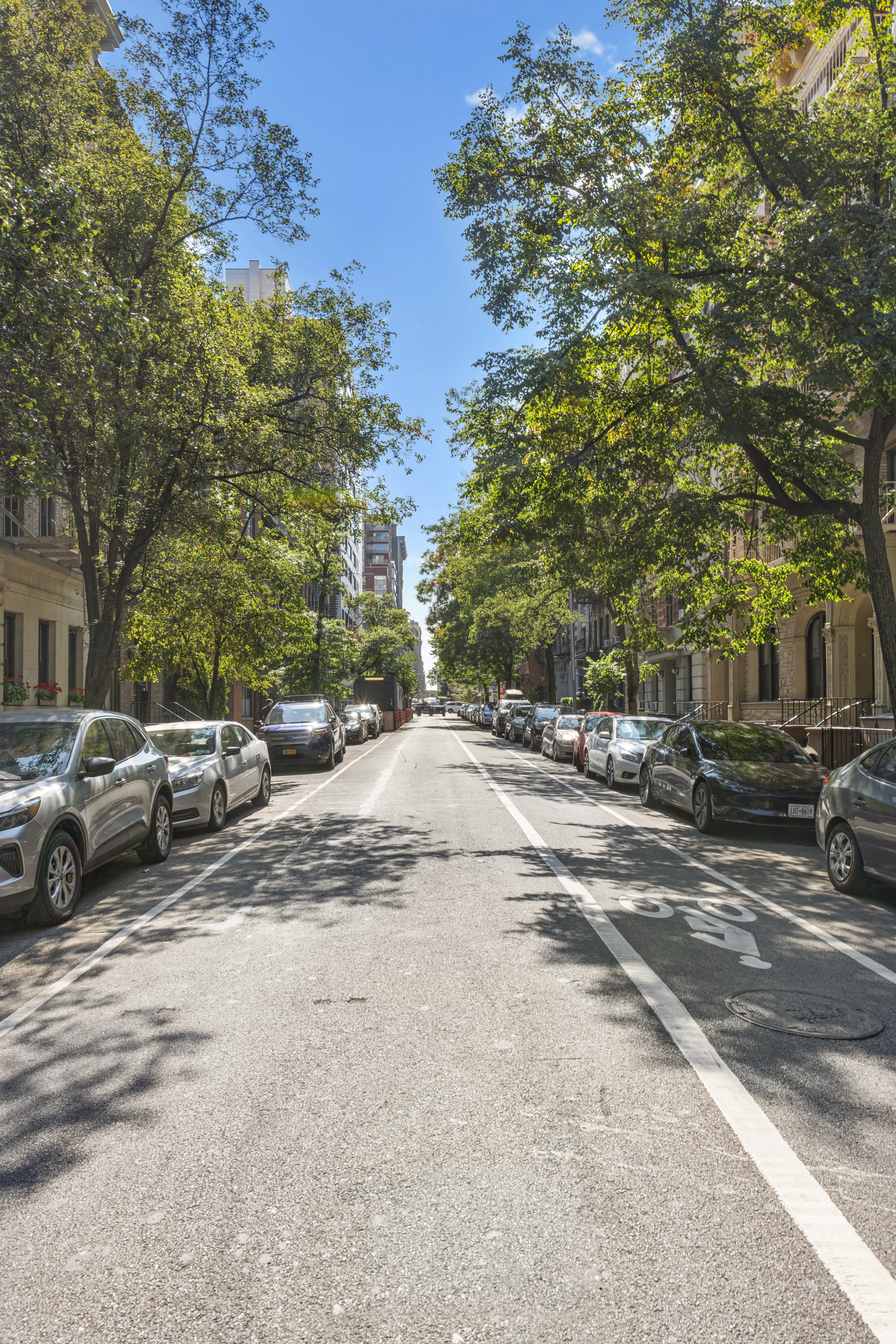 228 West 21st Street, Unit 2 Manhattan, NY 10011 - Photo 13 of 14 a view of street with parked cars