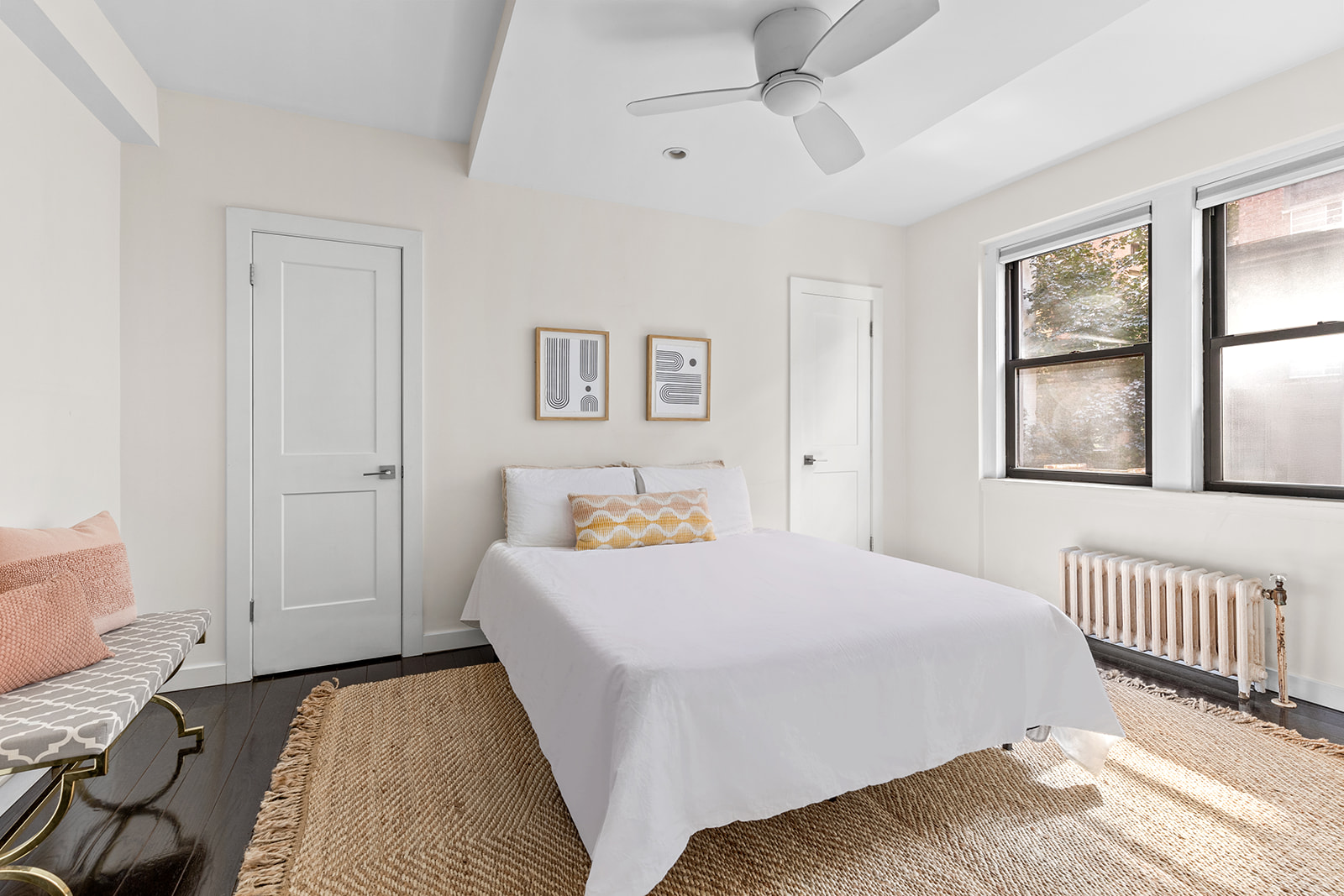 211 East 35th Street, Unit 4D Manhattan, NY 10016 - Photo 4 of 6 a bedroom with a bed and a window