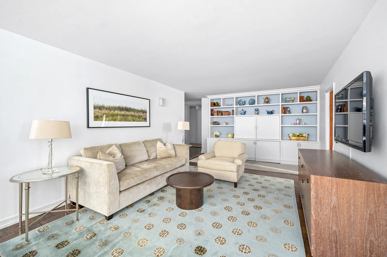 a living room with furniture and a table