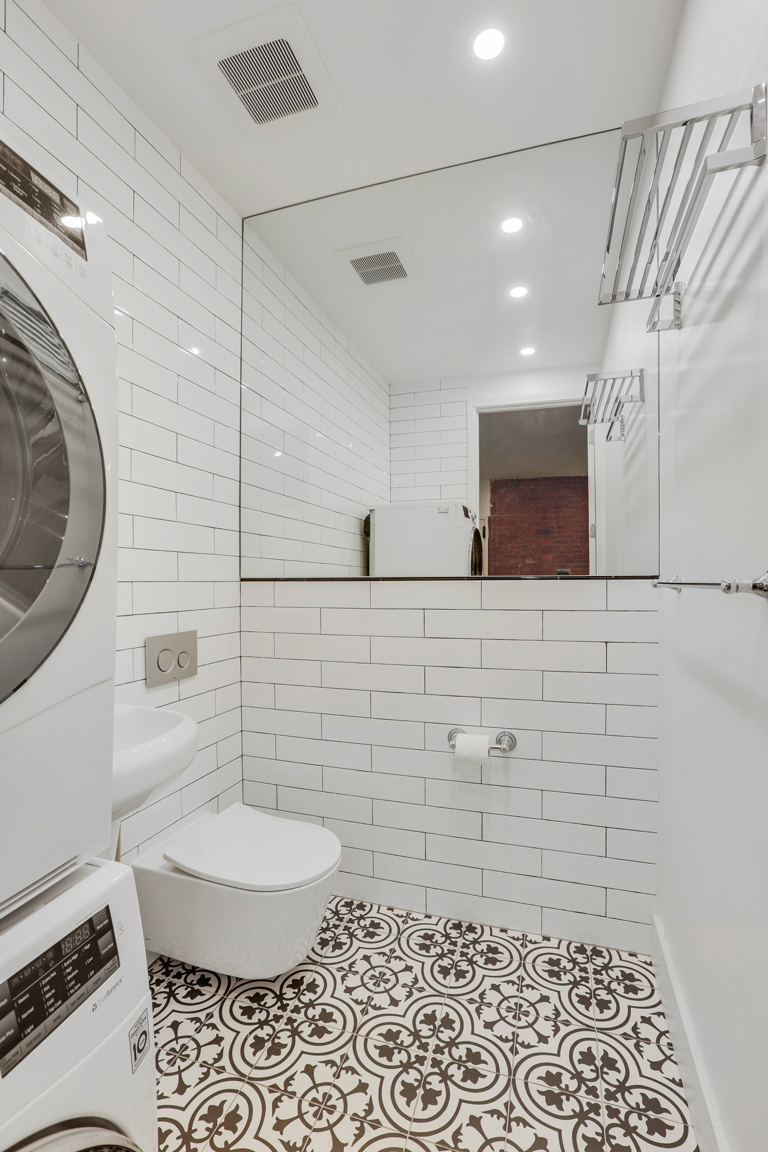 252 East 7th Street, Unit 7/8 Manhattan, NY 10009 - Photo 10 of 13 a bathroom with a toilet and a shower