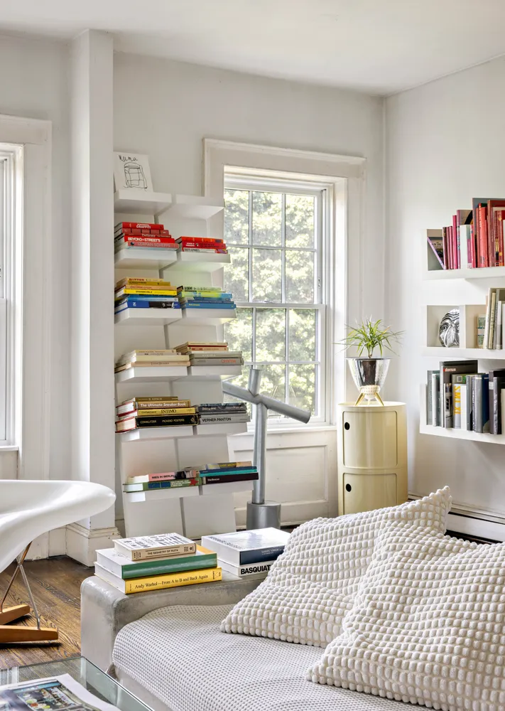 a room with a bed and a window