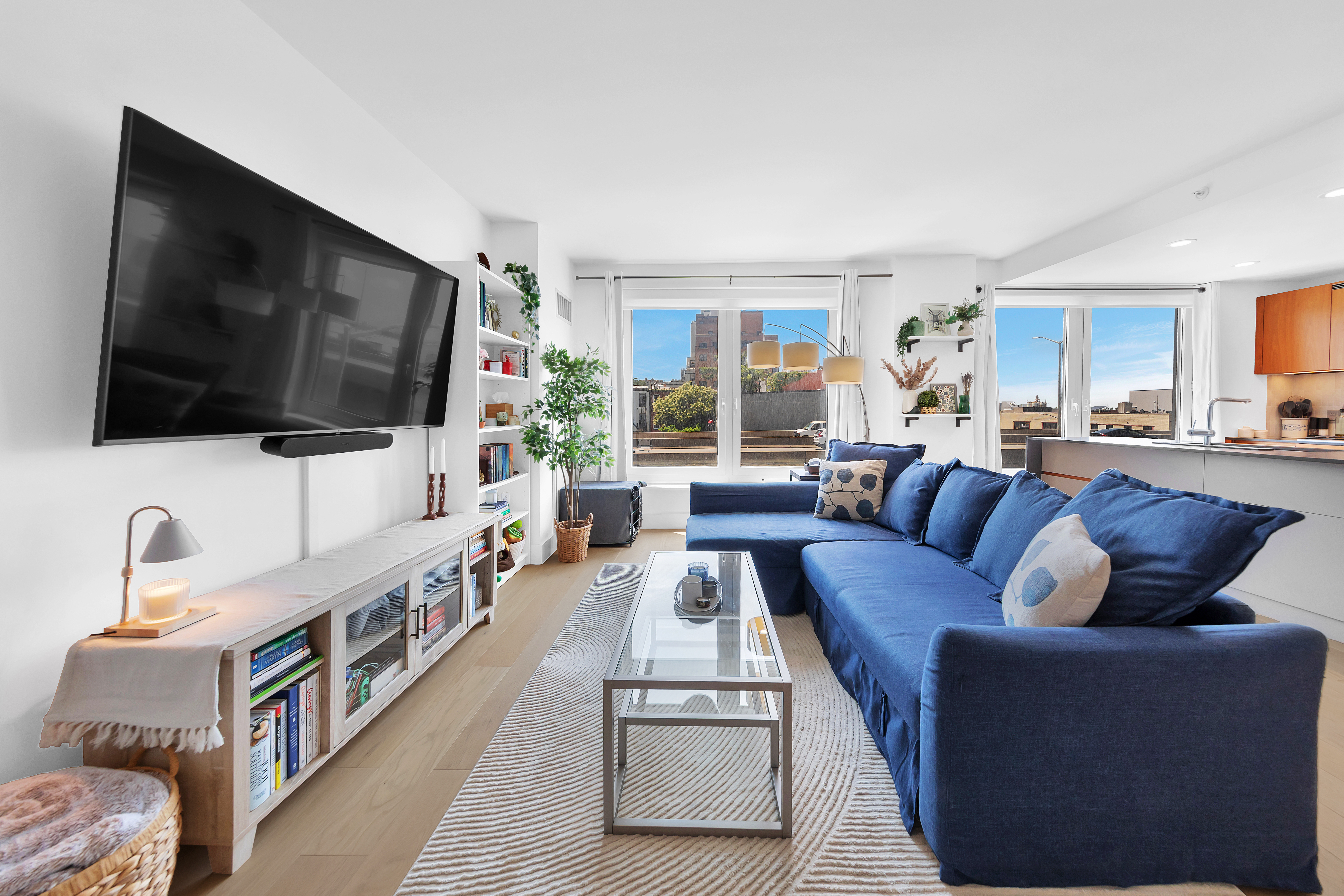 575 4th Avenue, Unit 3F Brooklyn, NY 11215 - Photo 2 of 15 a living room with furniture and a flat screen tv