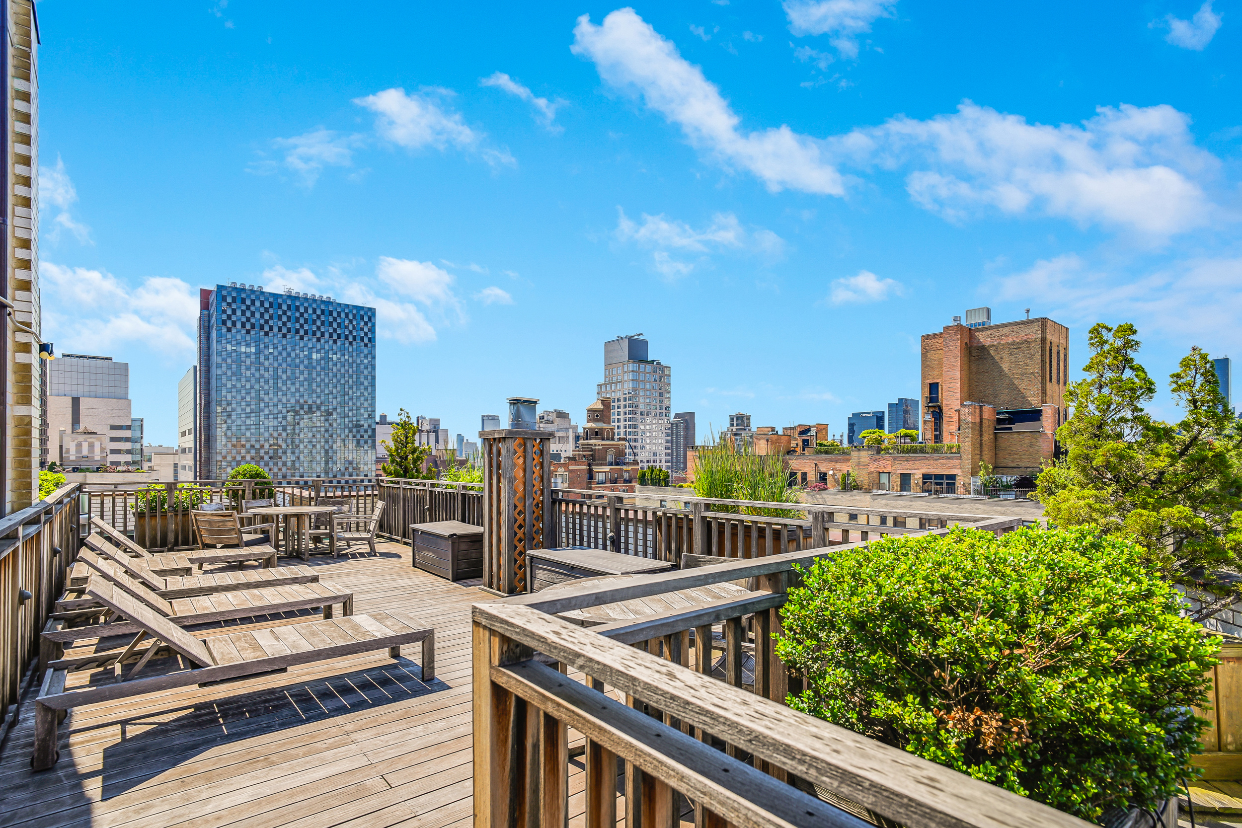 301 East 69th Street, Unit 3M Manhattan, NY 10021 - Photo 11 of 12 a view of a city with tall buildings
