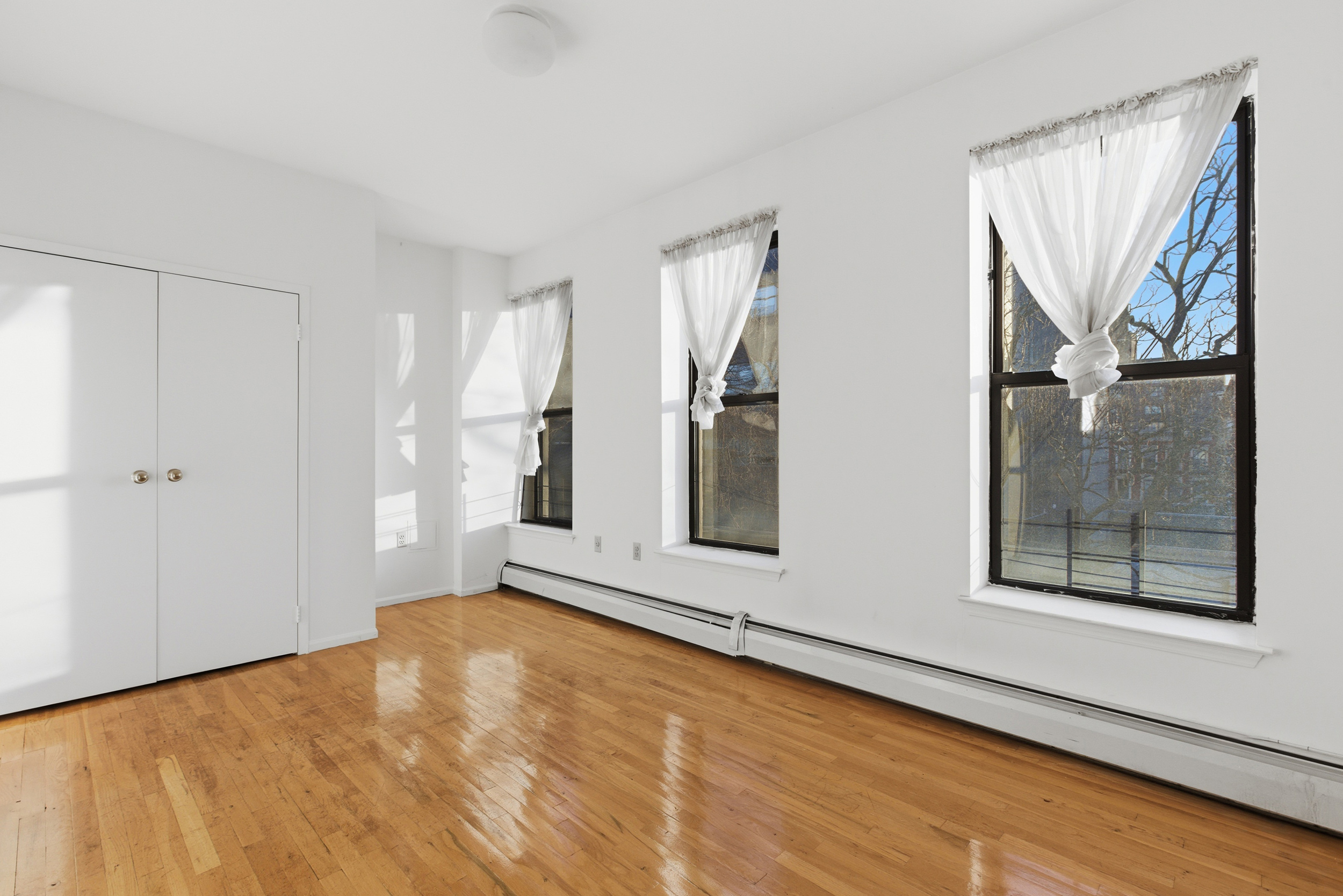 20 East 126th Street Manhattan, NY 10035 - Photo 15 of 19 a view of an empty room with a window