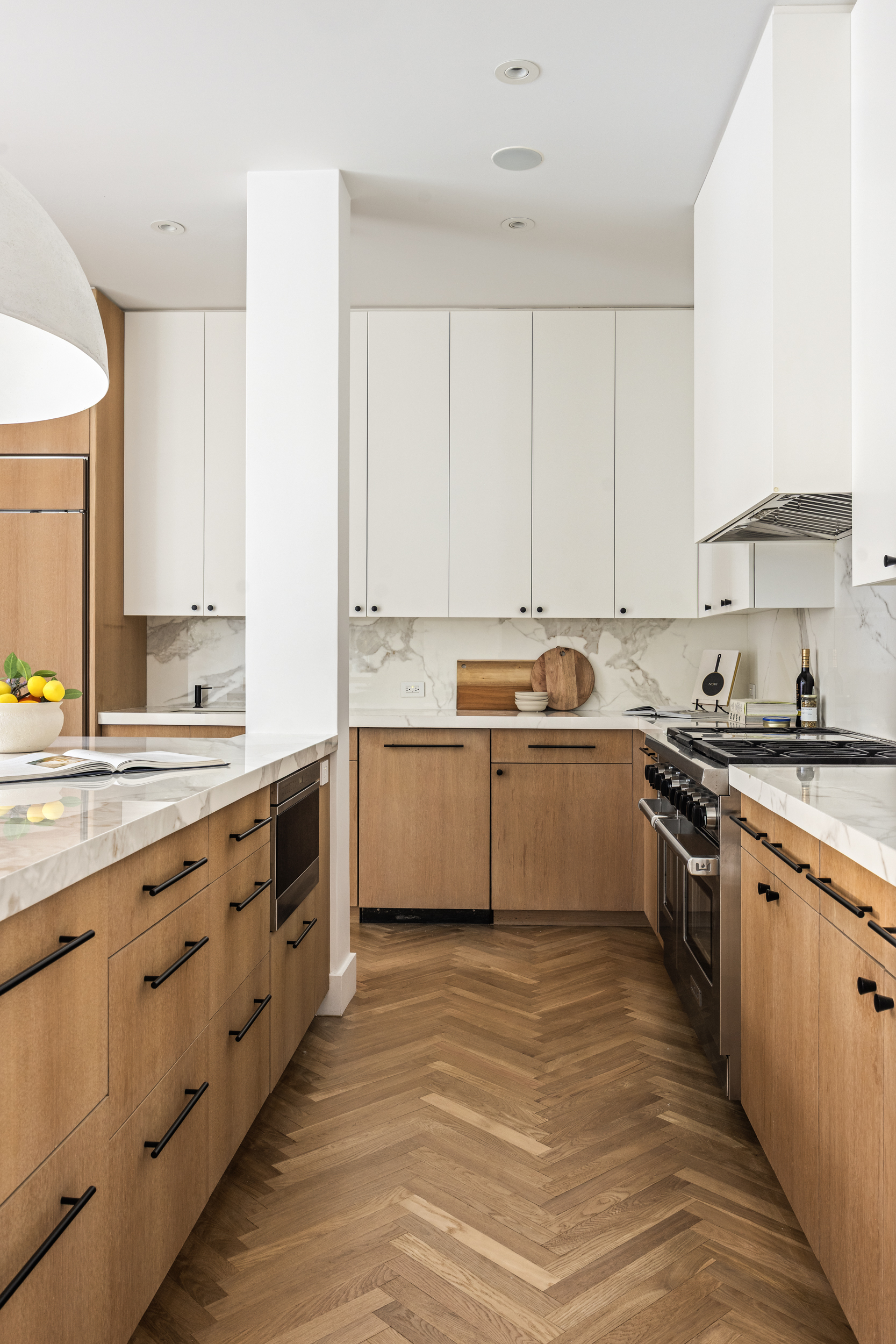 45 Warren Street, Unit PH Manhattan, NY 10007 - Photo 10 of 29 a kitchen with stainless steel appliances granite countertop a stove sink and cabinets