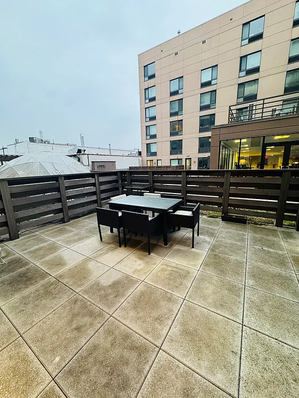 44-72 11th Street, Unit A207 Queens, NY 11101 - Photo 4 of 11 a view of a terrace with chairs