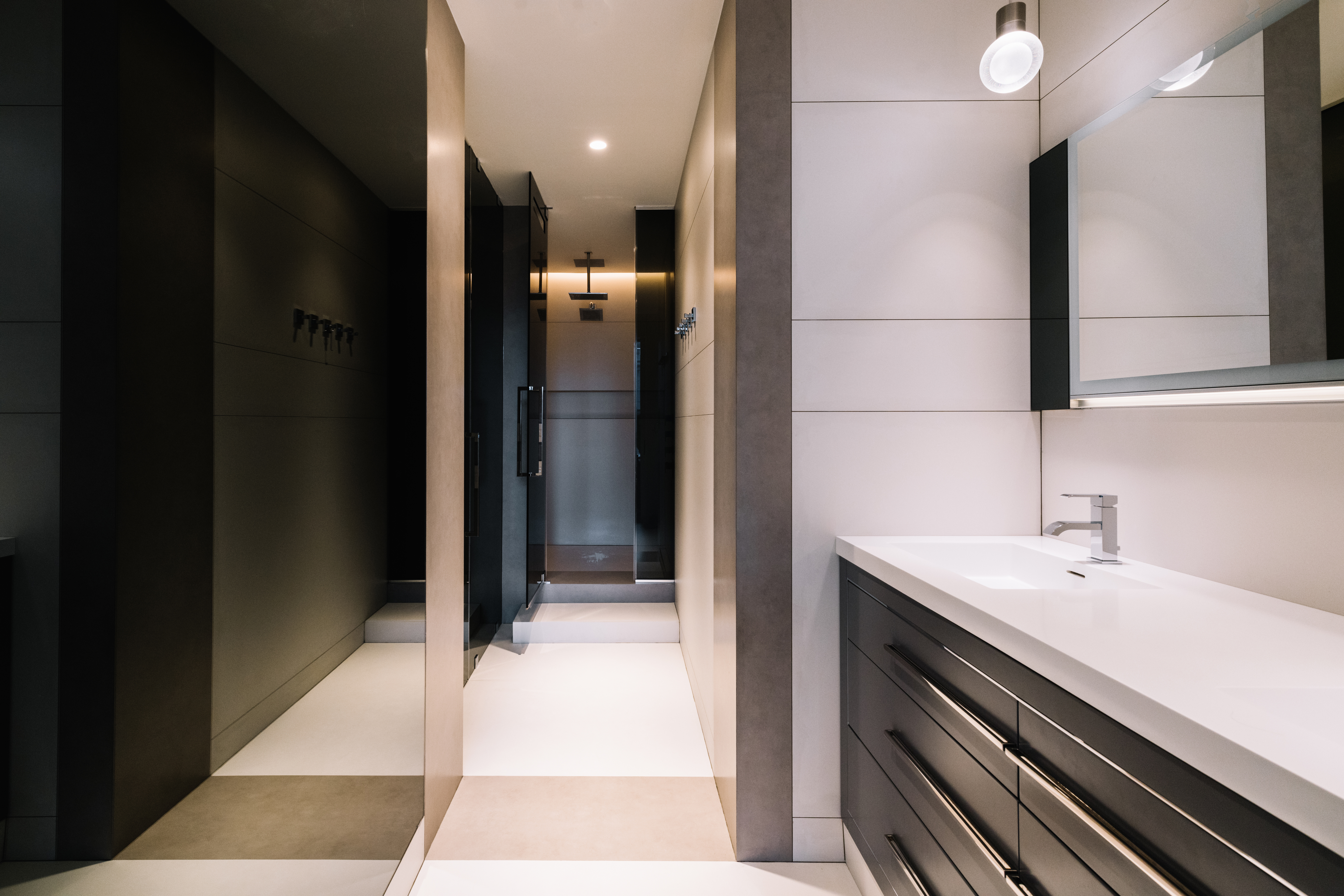 255 Hudson Street, Unit 9C Manhattan, NY 10013 - Photo 11 of 19 a bathroom with a sink and a mirror