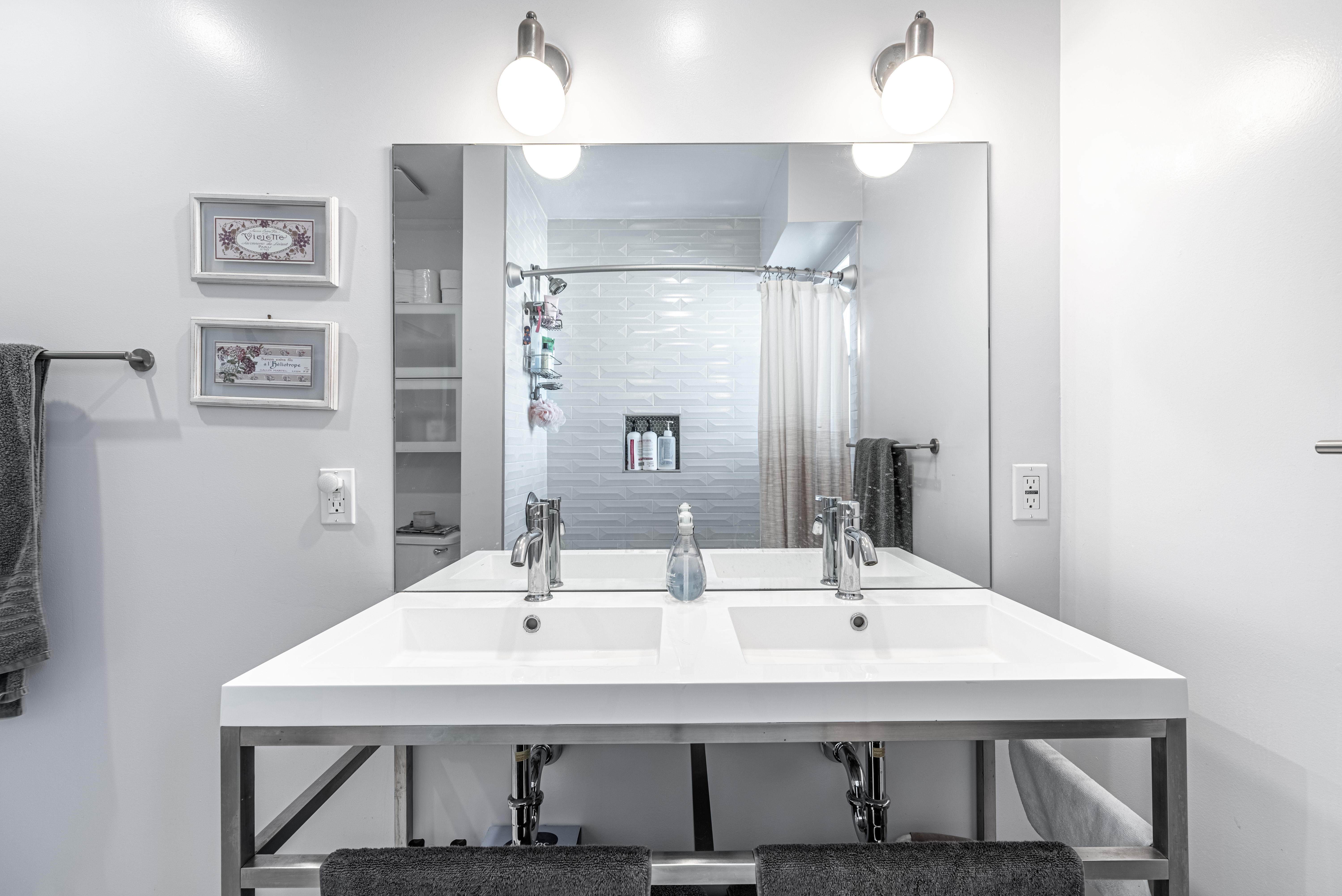 1005 Alexandria Avenue Los Angeles, CA 90029 - Photo 13 of 21 a bathroom with a sink and a mirror
