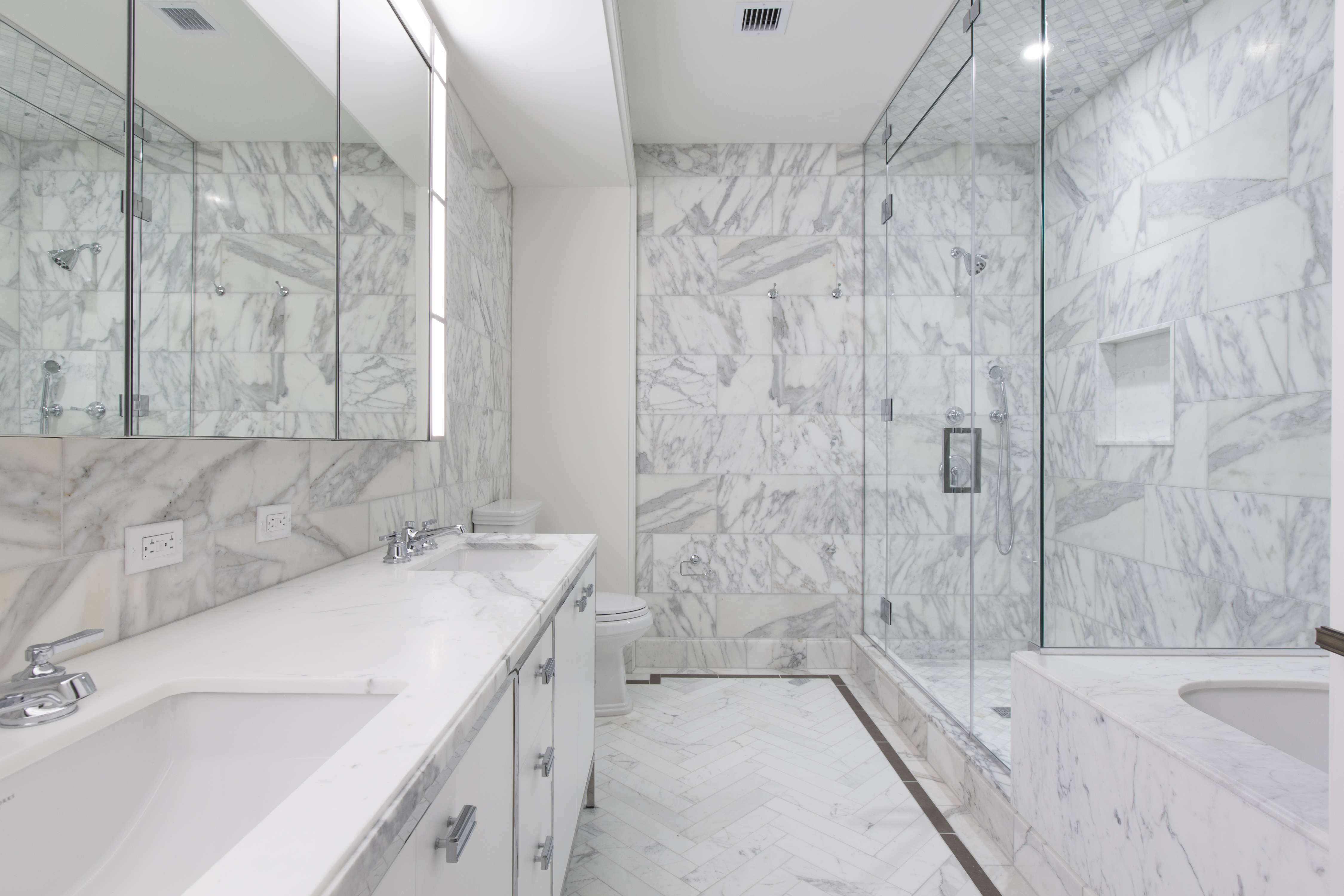 100 Barclay Street, Unit 14K Manhattan, NY 10007 - Photo 5 of 9 a bathroom with a sink and a bathtub