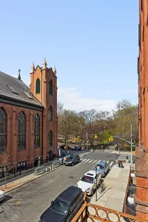 a view of a livingroom with wooden floor