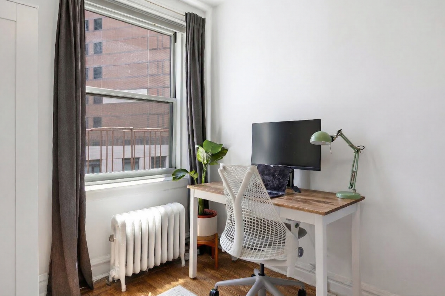 30 Clinton Street, Unit 6A Brooklyn, NY 11201 - Photo 4 of 11 a dining room with furniture and a window