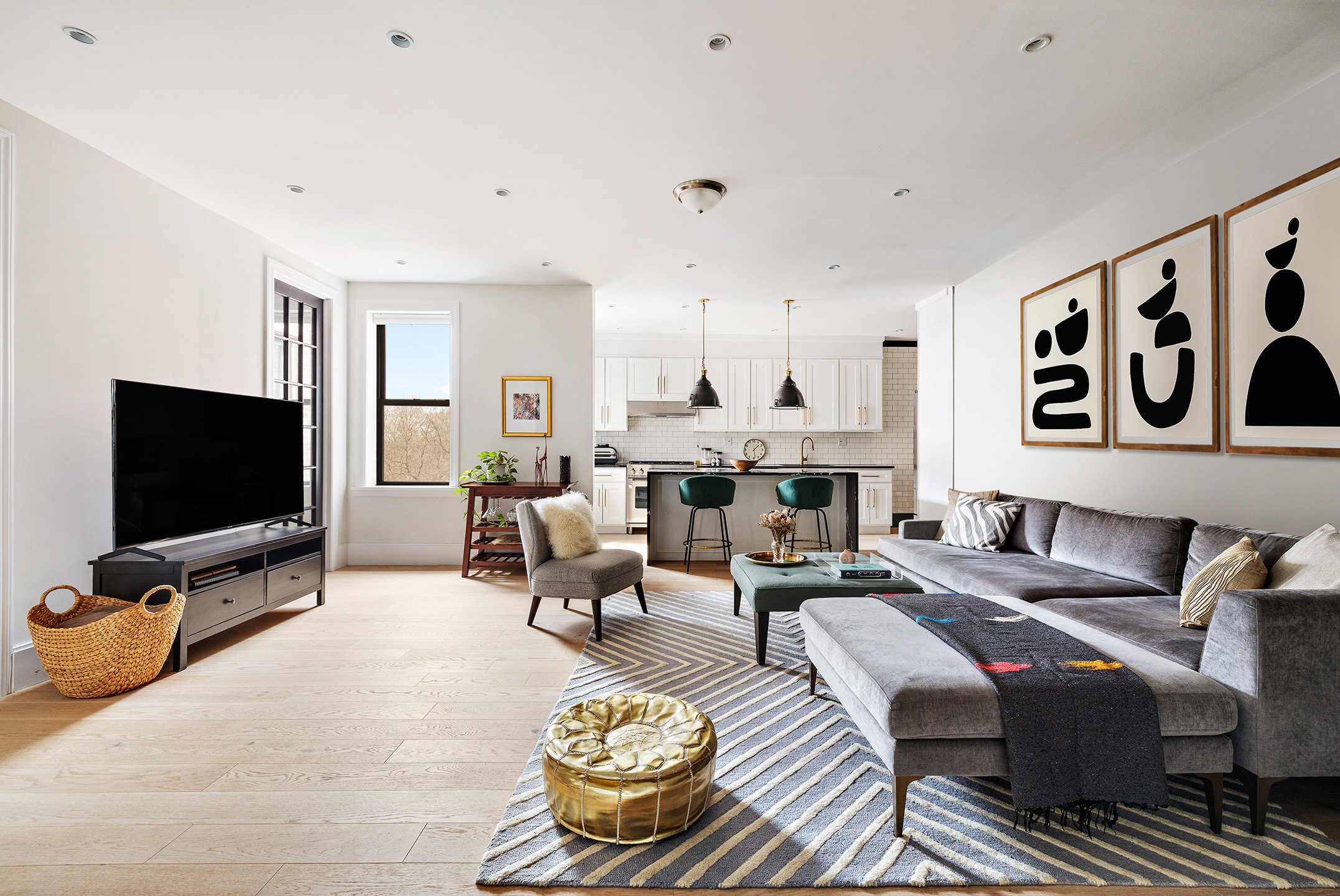 a living room with fireplace furniture and a flat screen tv