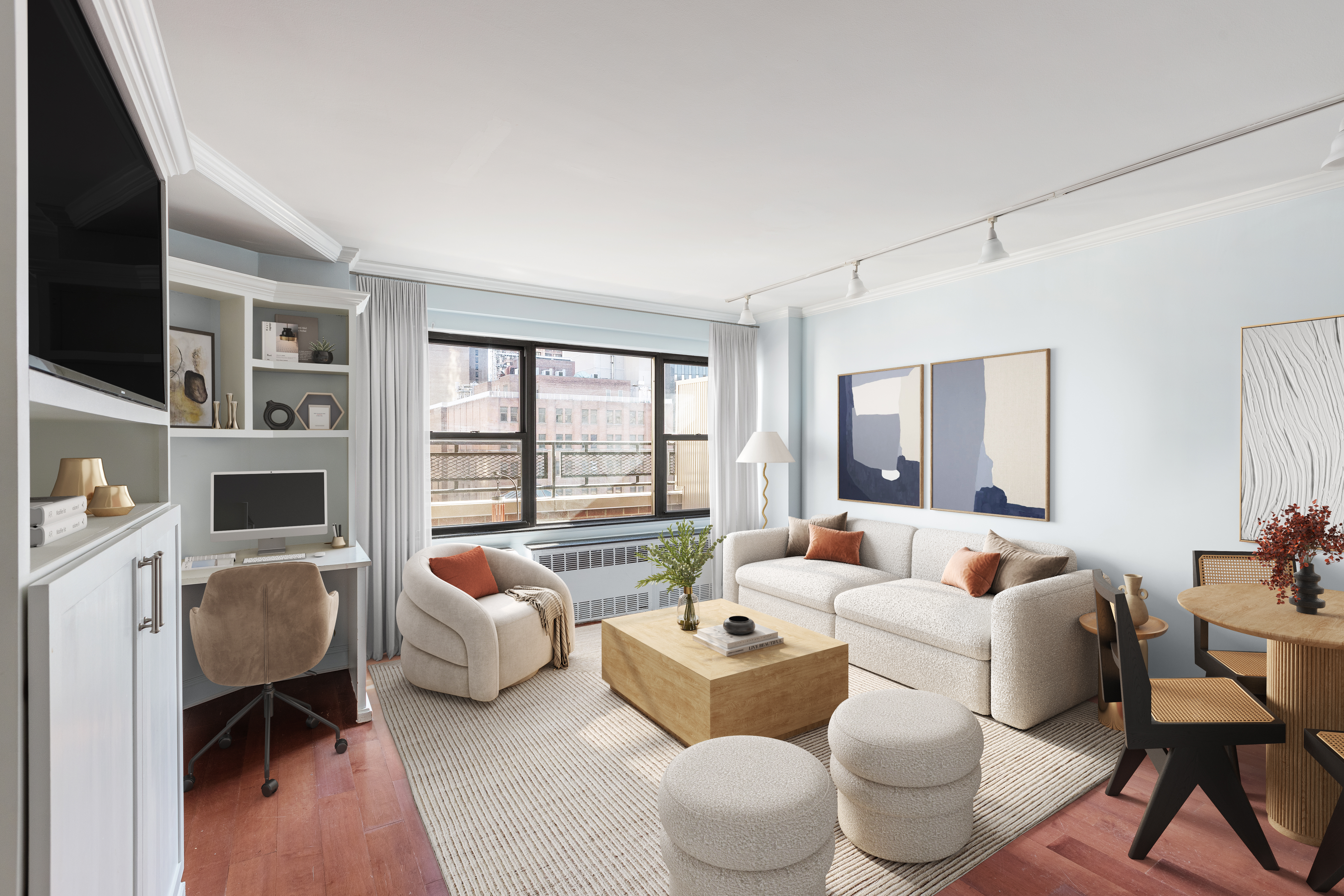 210 East 36th Street, Unit PHC Manhattan, NY 10016 - Photo 1 of 13 a living room with furniture and a large window