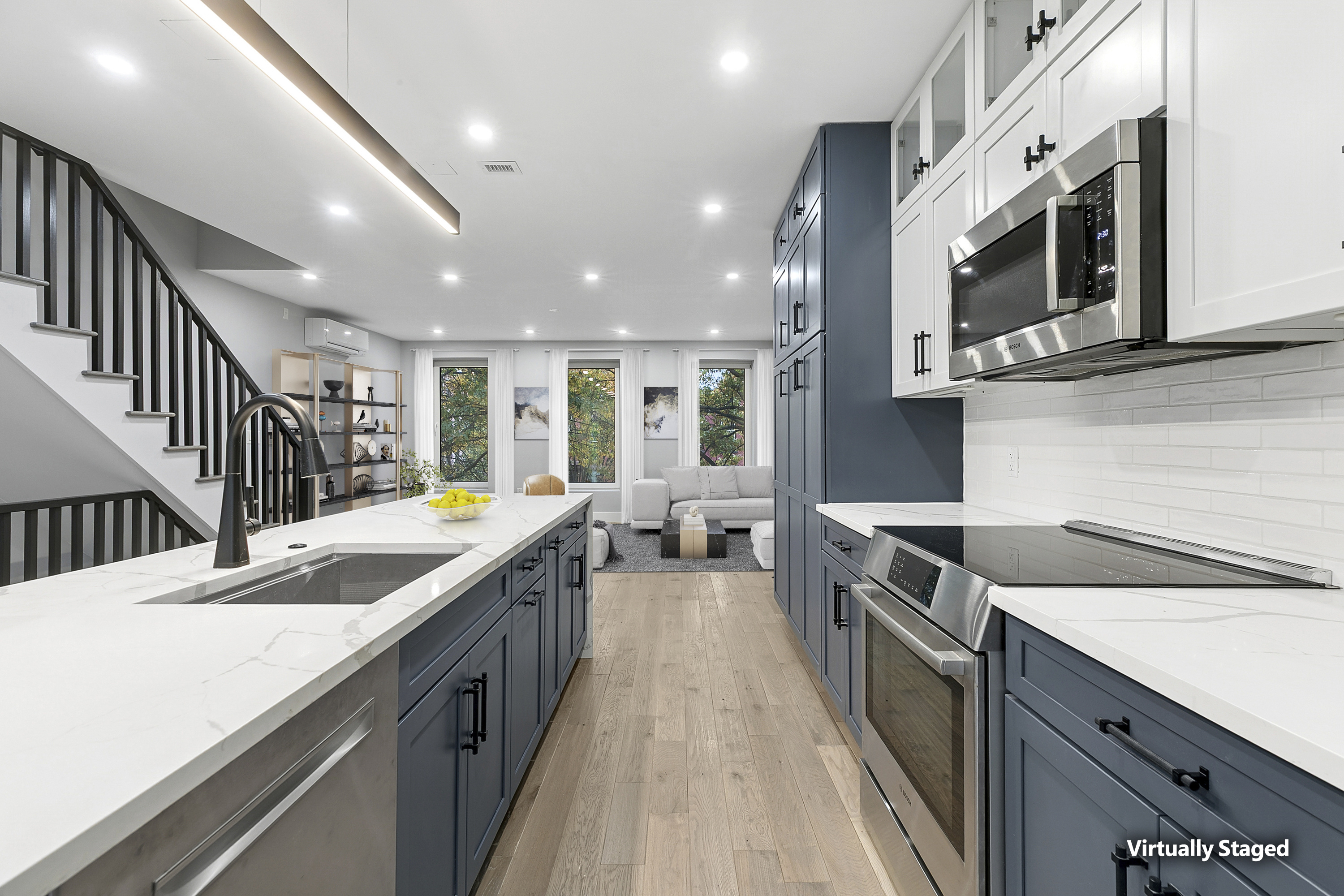 434 Throop Avenue, Unit 2 Brooklyn, NY 11221 - Photo 3 of 20 a kitchen with stainless steel appliances granite countertop counter space a sink and cabinets