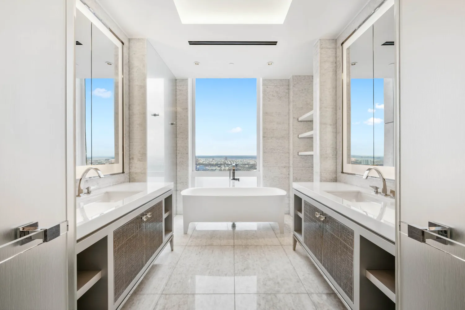 a large kitchen with a sink and a large mirror