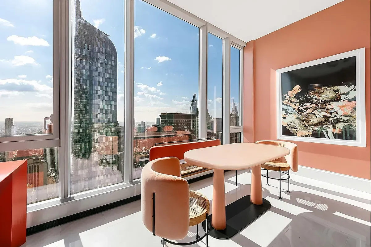 a outdoor dining space with furniture and a garden