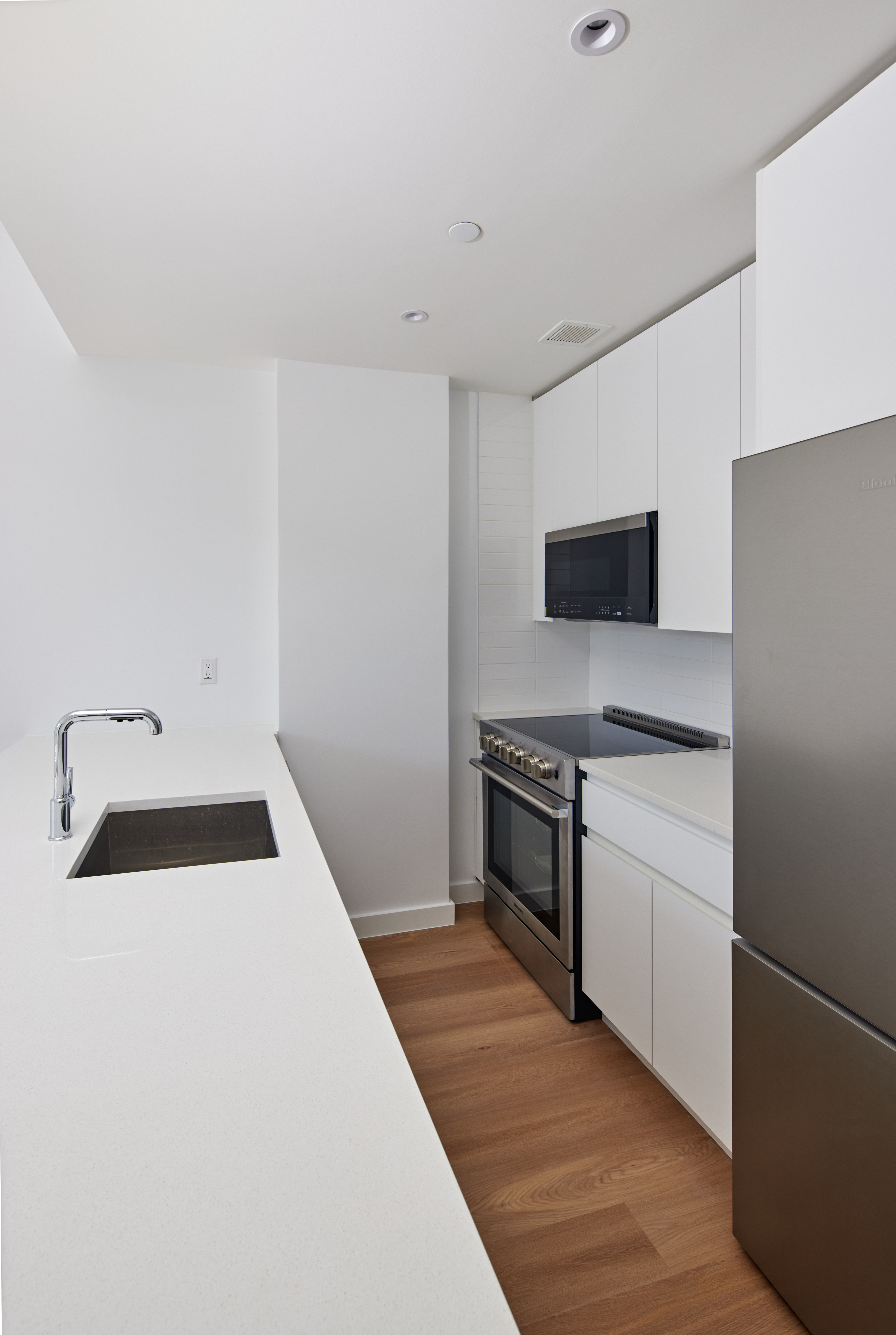 340 Lenox Road, Unit 3A Brooklyn, NY 11226 - Photo 3 of 25 a kitchen with a sink and a stove top oven