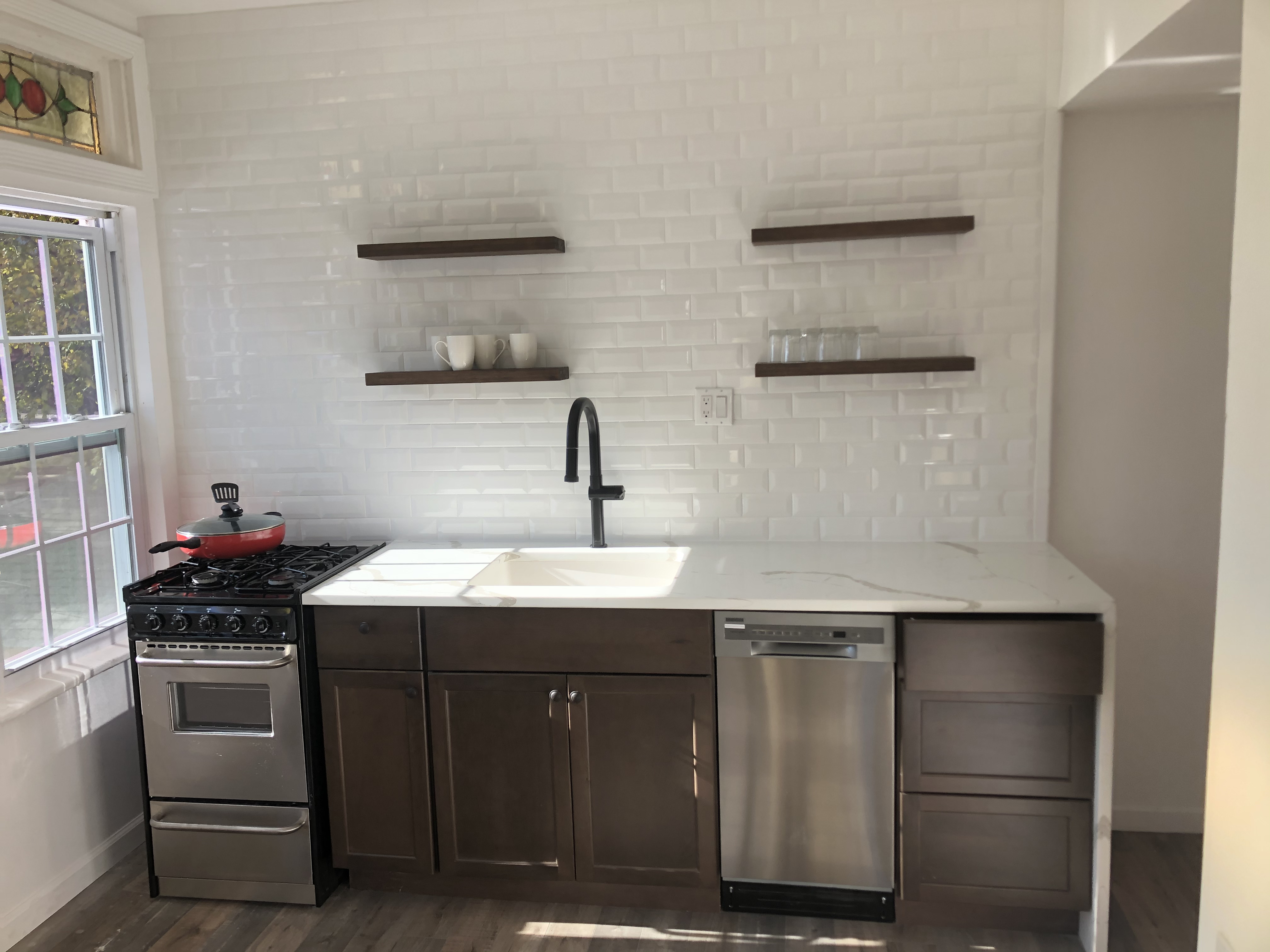1112 Beverley Road Brooklyn, NY 11218 - Photo 24 of 53 a kitchen with a sink and cabinets