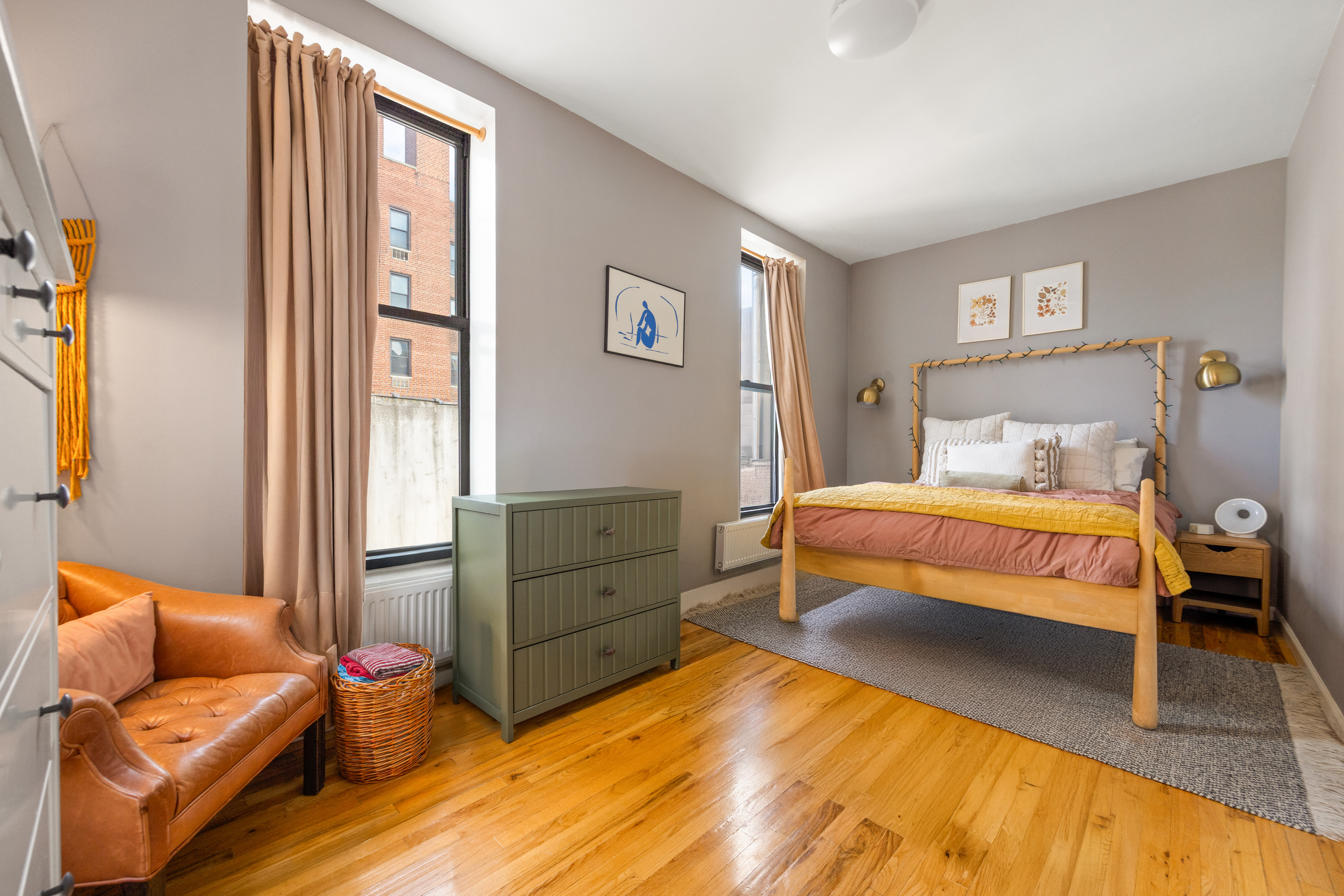 44 Turner Place, Unit 2 Brooklyn, NY 11218 - Photo 4 of 9 a bedroom with a bed and wooden floor