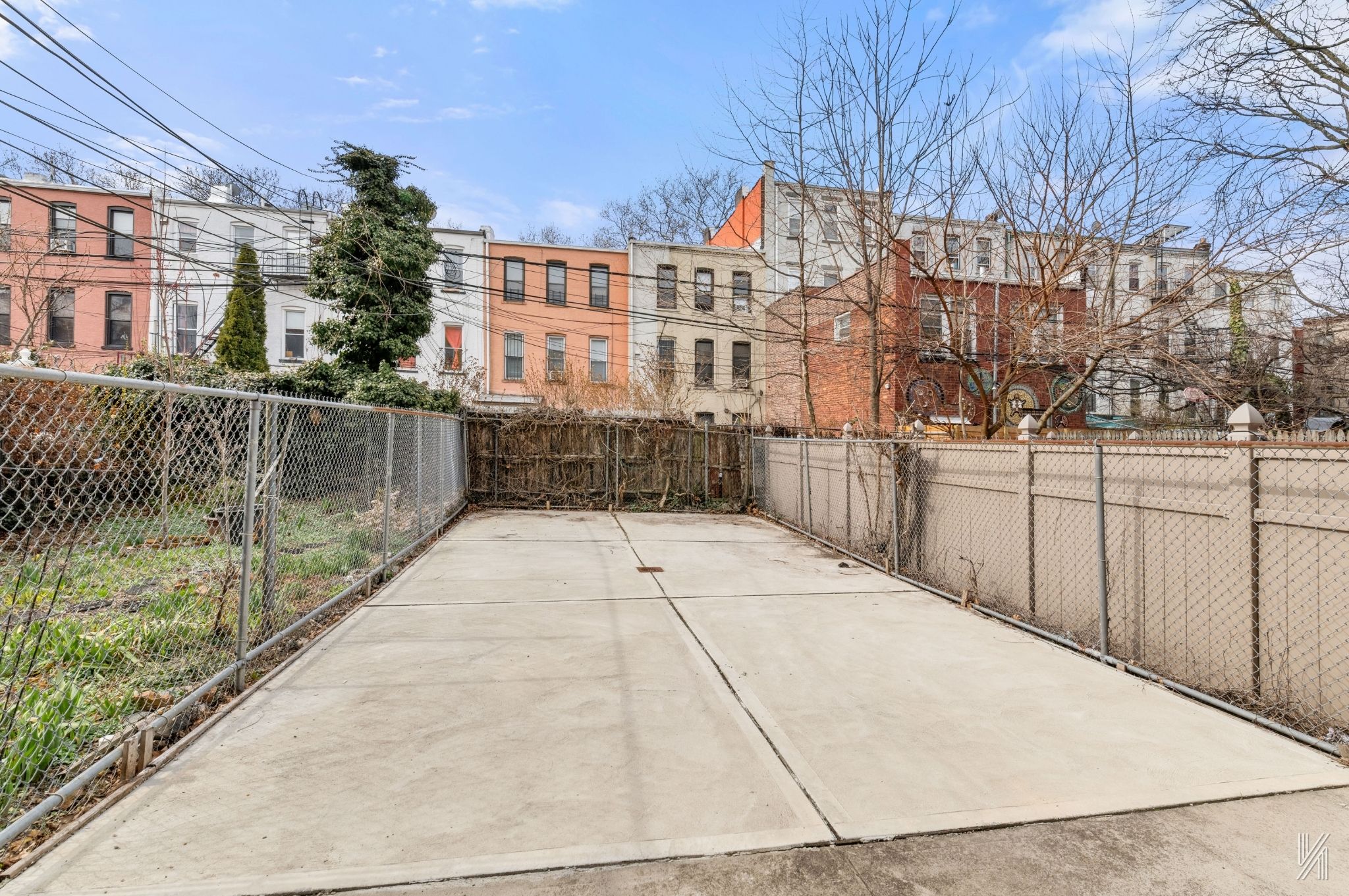 426 54th Street Brooklyn, NY 11220 - Photo 18 of 22 a view of a pathway with a building in the background