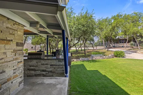 a view of a lake with a big yard