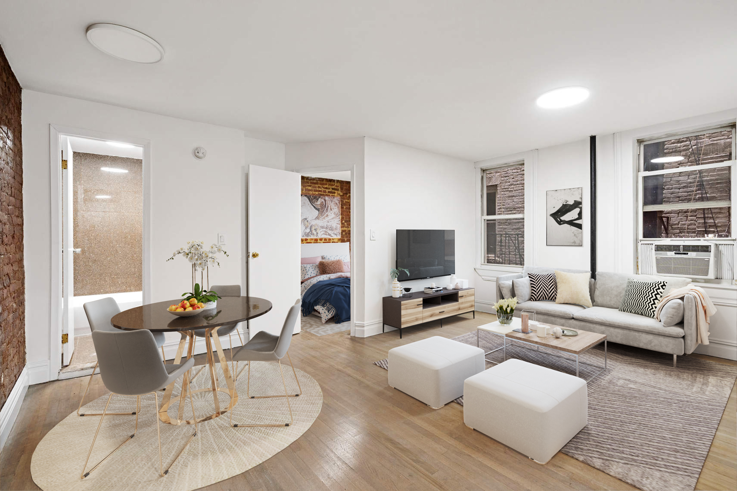 150 East 3rd Street, Unit 2D Manhattan, NY 10009 - Photo 1 of 4 a living room with furniture and a flat screen tv
