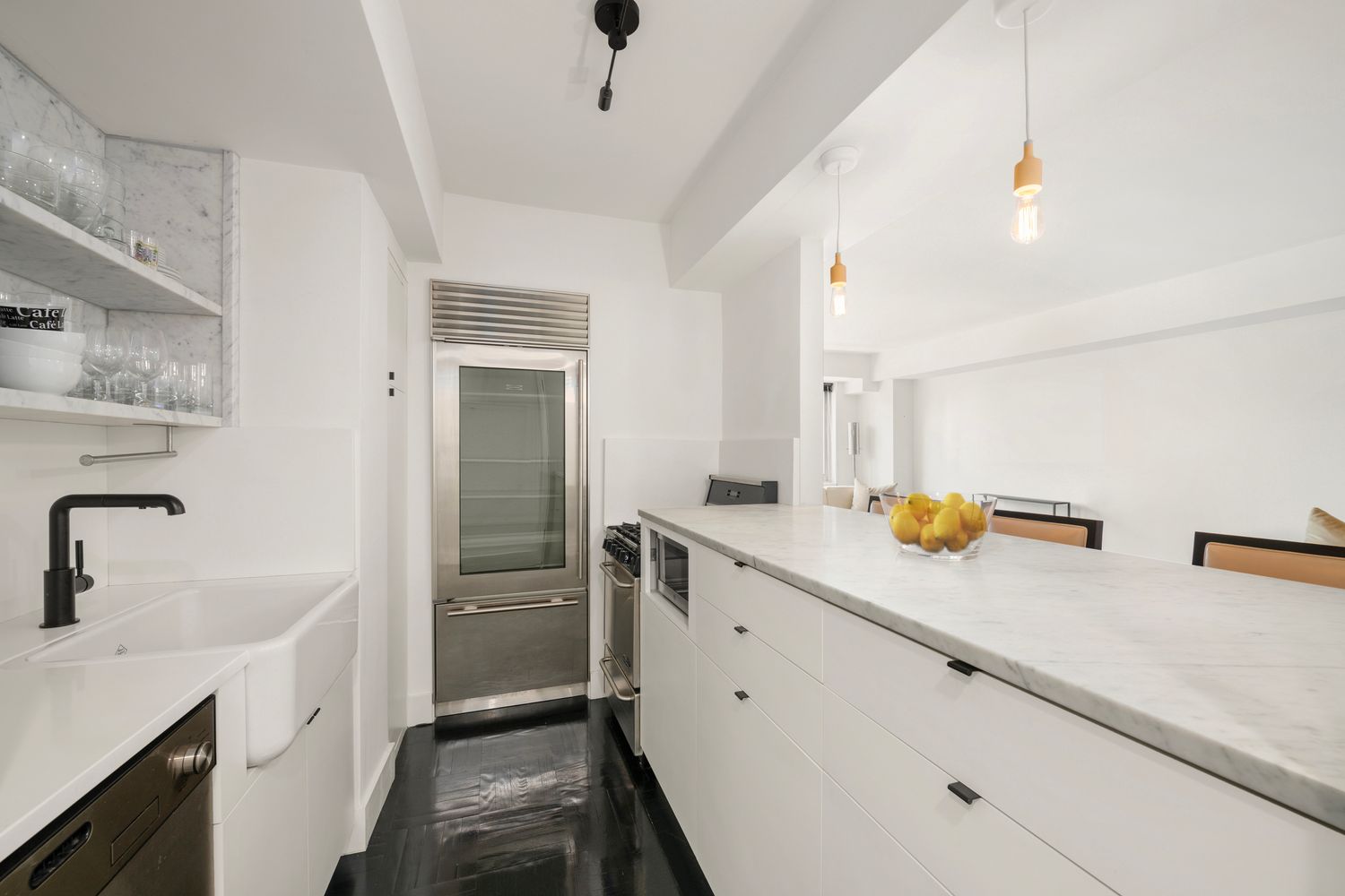 a kitchen with a sink and cabinets