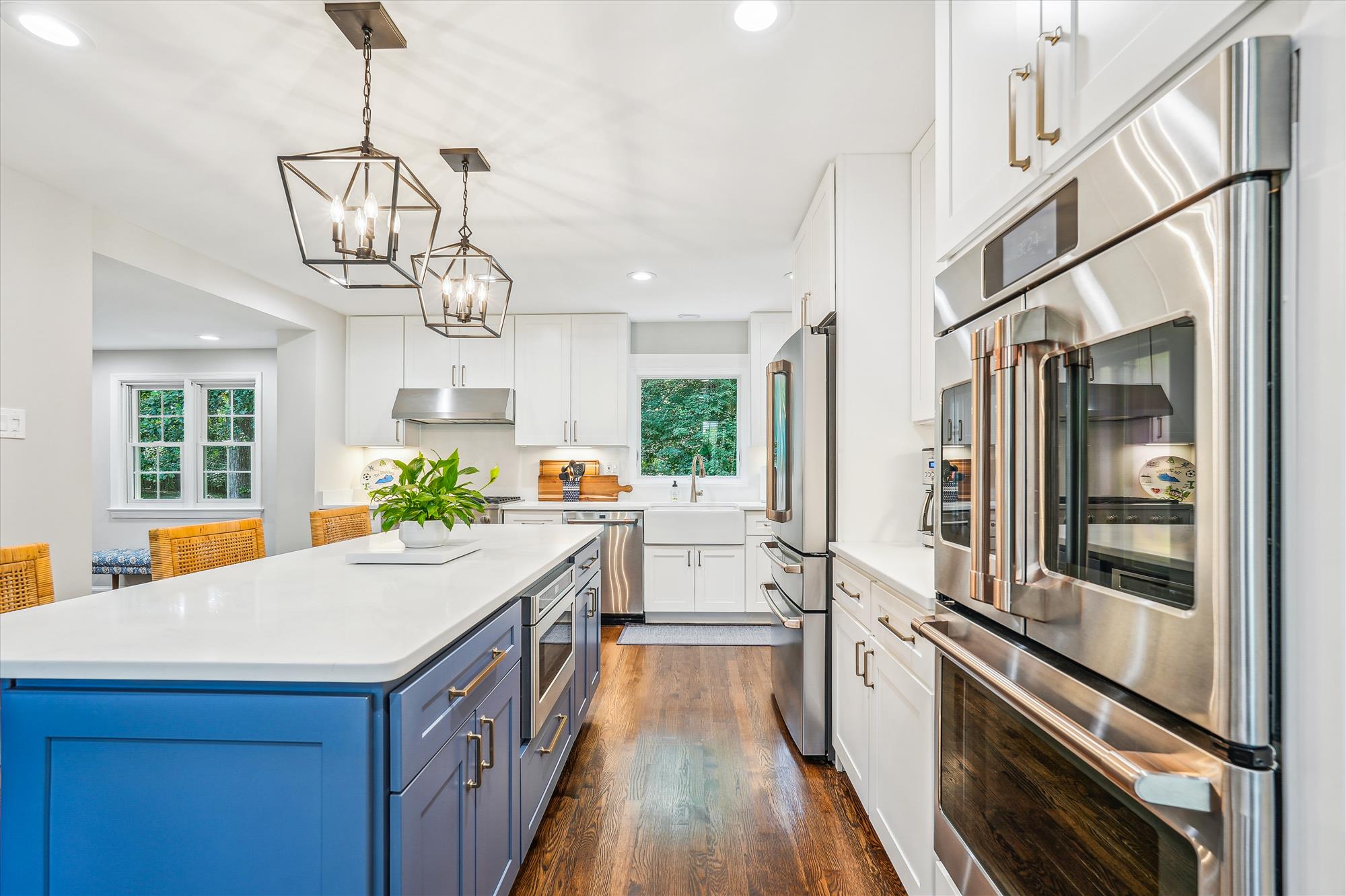 9904 Carter Road Bethesda, MD 20817 - Photo 14 of 41 a kitchen with stainless steel appliances granite countertop a sink and stove