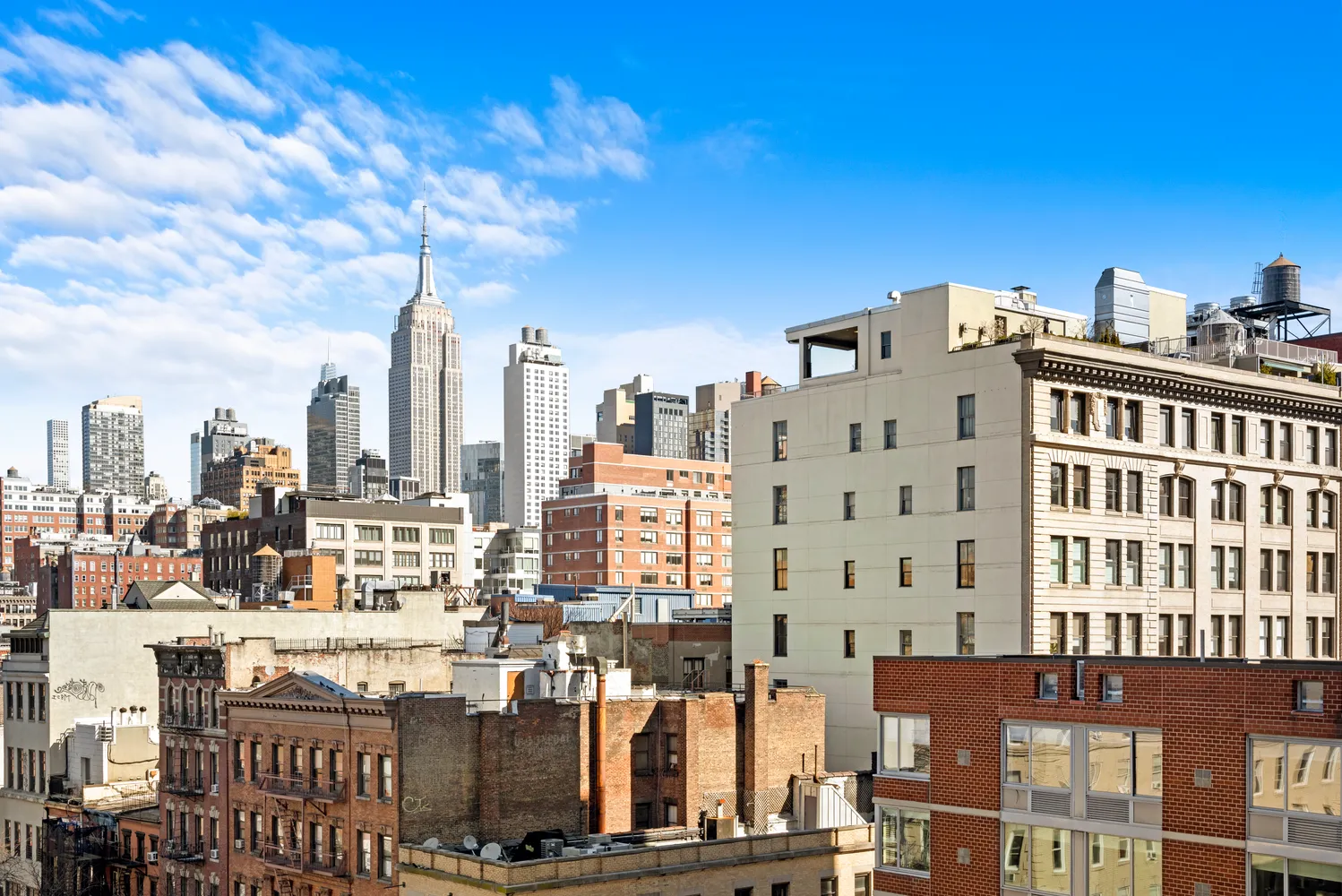 a city view with tall buildings