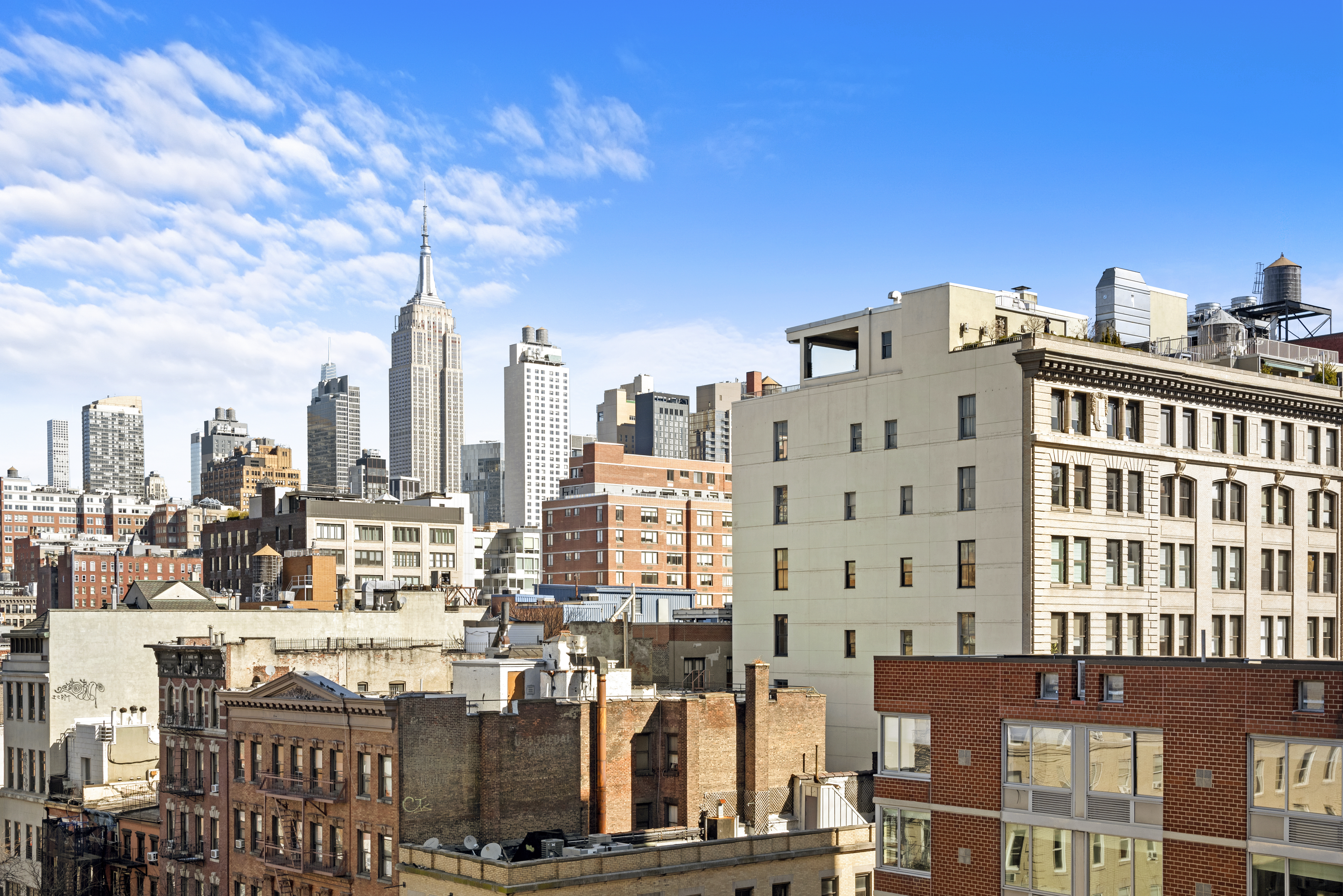 305 West 16th Street, Unit PHD Manhattan, NY 10011 - Photo 11 of 12 a city view with tall buildings