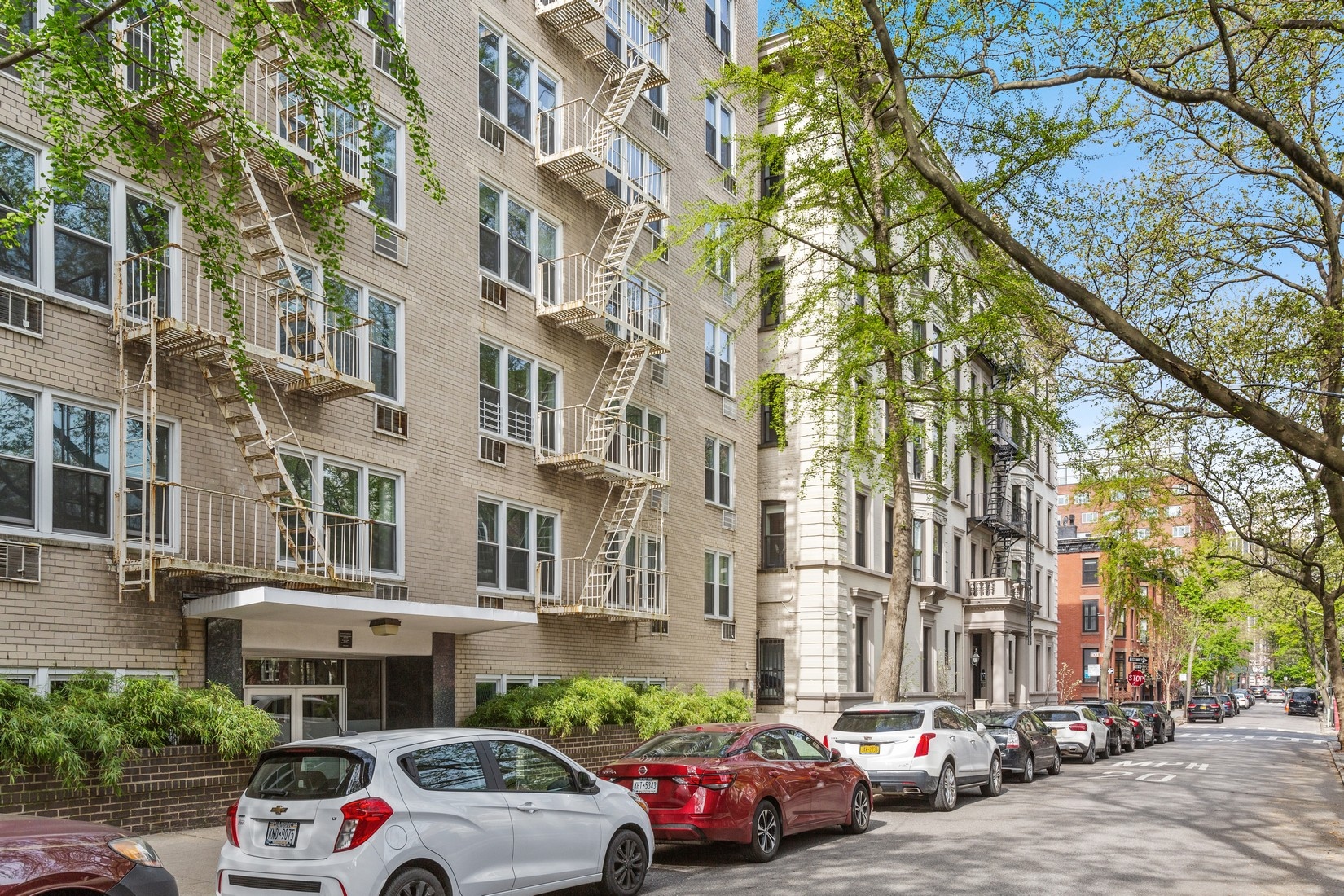 54 Orange Street, Unit 4D Brooklyn, NY 11201 - Photo 9 of 10 a buildings with car parked in front of it