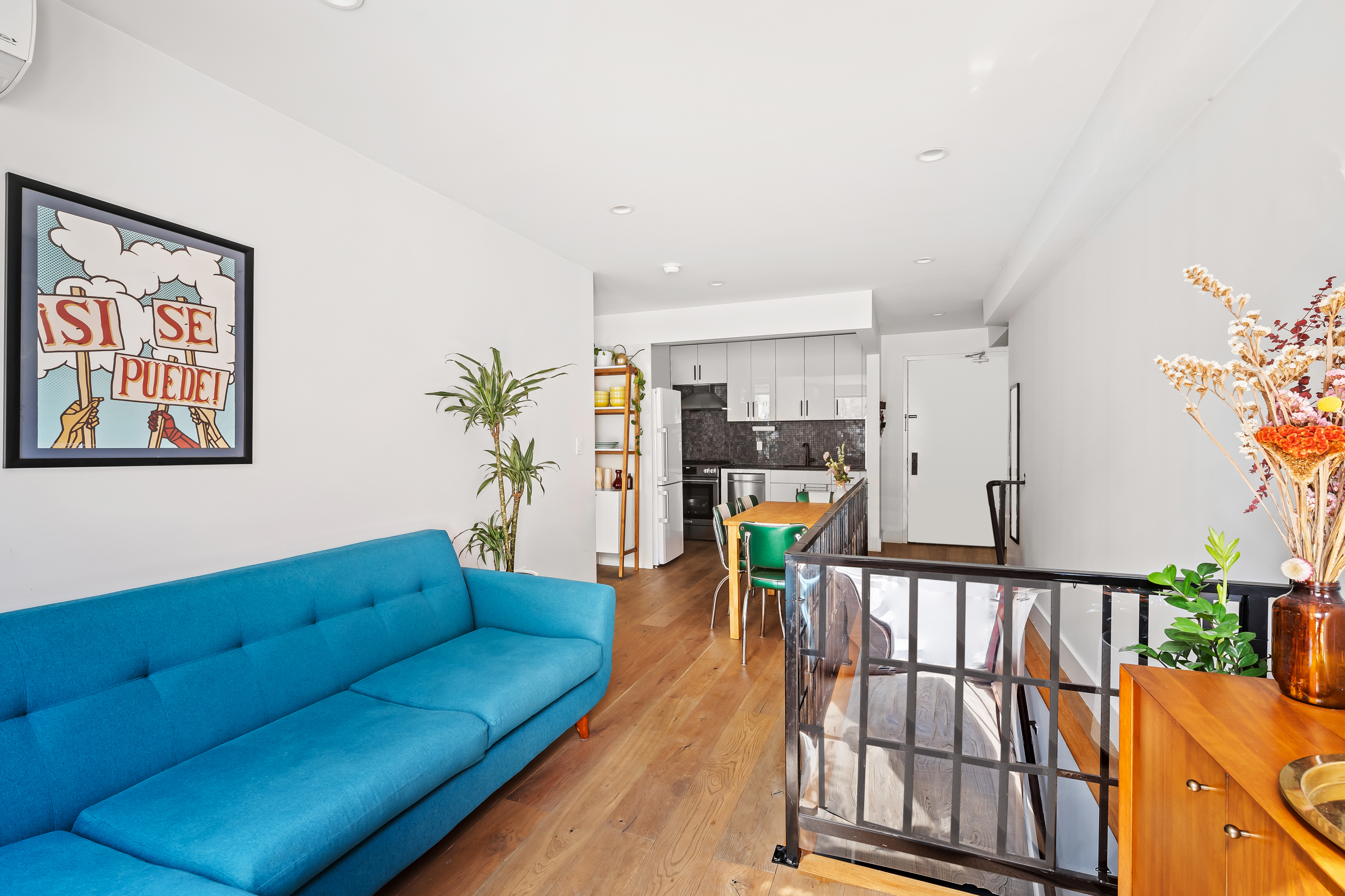 158 15th Street, Unit 1B Brooklyn, NY 11215 - Photo 4 of 14 a living room with furniture and wooden floor