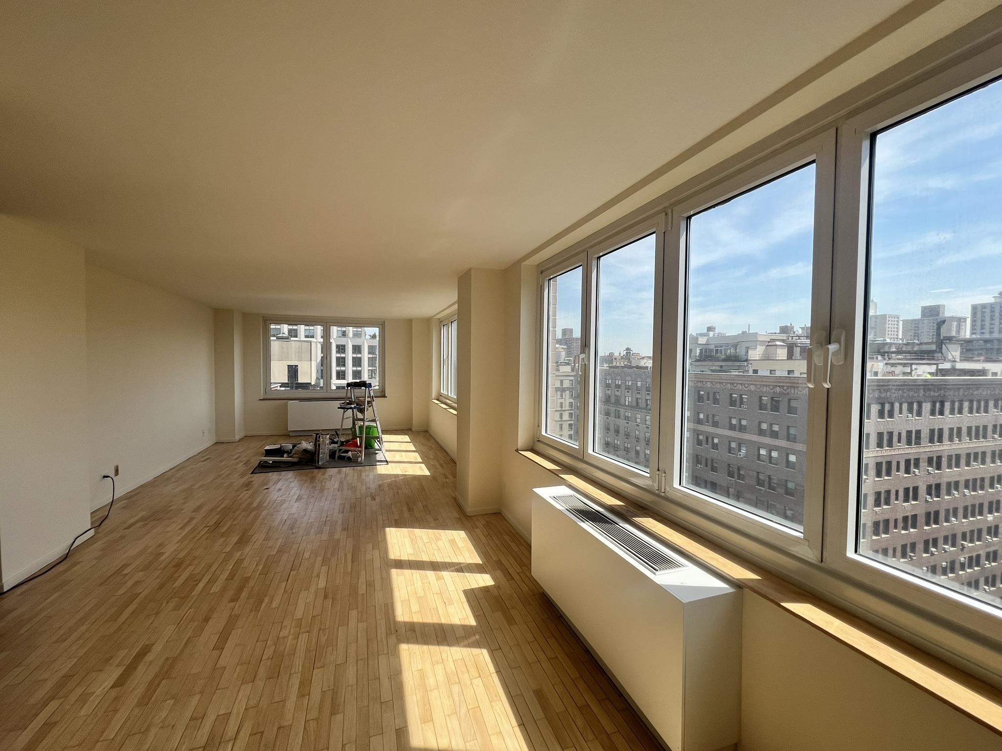 250 West 90th Street, Unit PH2F Manhattan, NY 10024 - Photo 8 of 21 a view of a room with wooden floor and furniture
