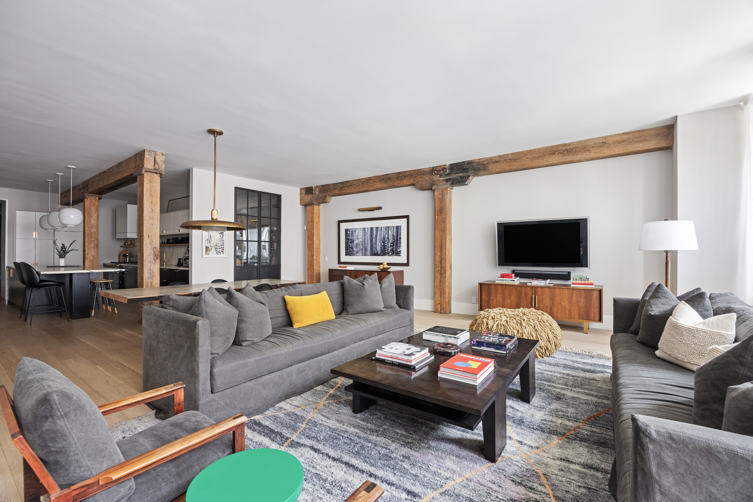 622 Greenwich Street, Unit 4B Manhattan, NY 10014 - Photo 6 of 27 a living room with furniture and a flat screen tv