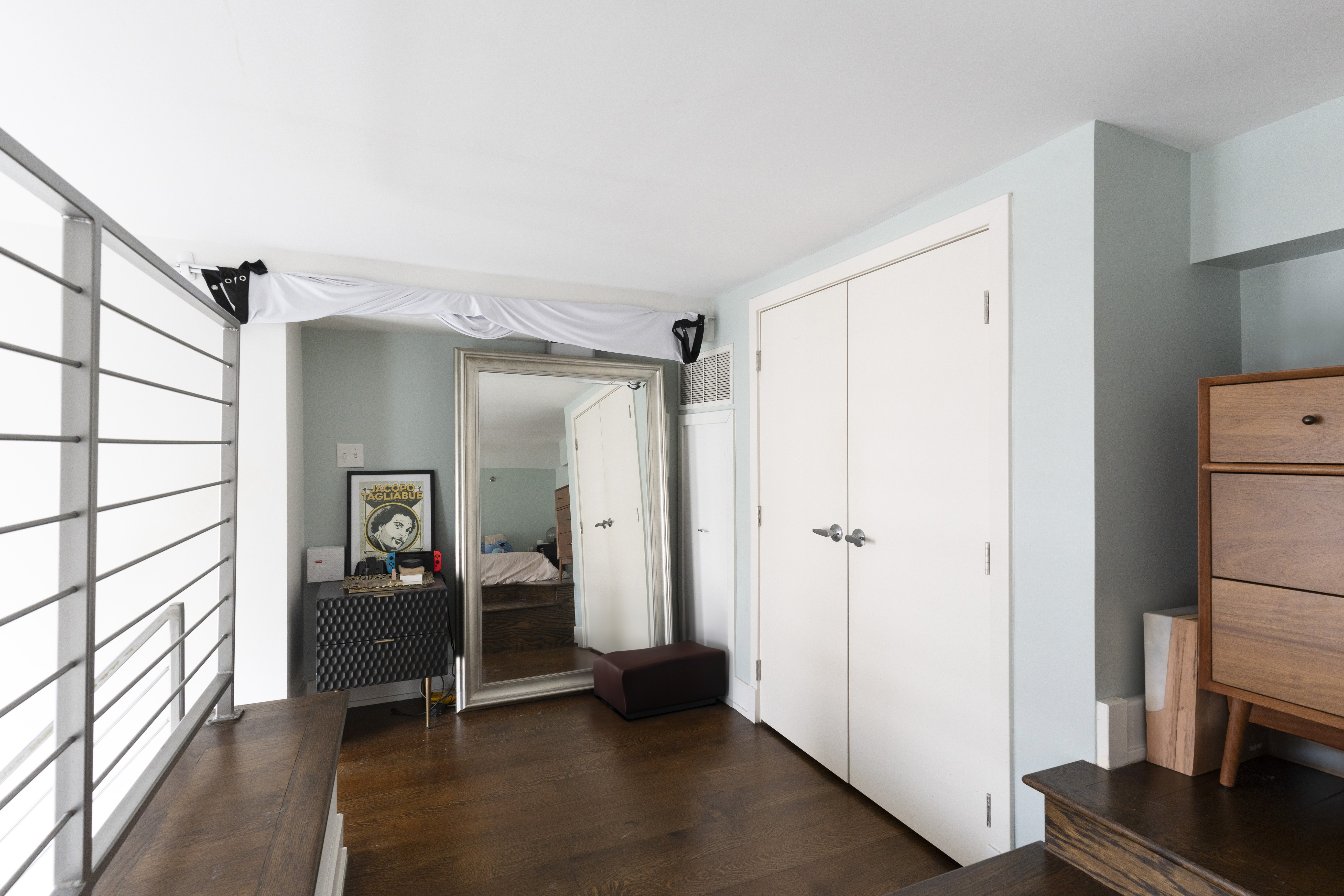 390 Lorimer Street, Unit 3H Brooklyn, NY 11206 - Photo 6 of 13 a view of room with furniture and a refrigerator