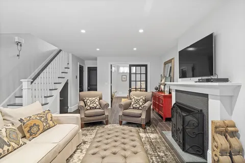 a work room with furniture and wooden floor