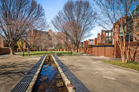 a view of a building with a yard